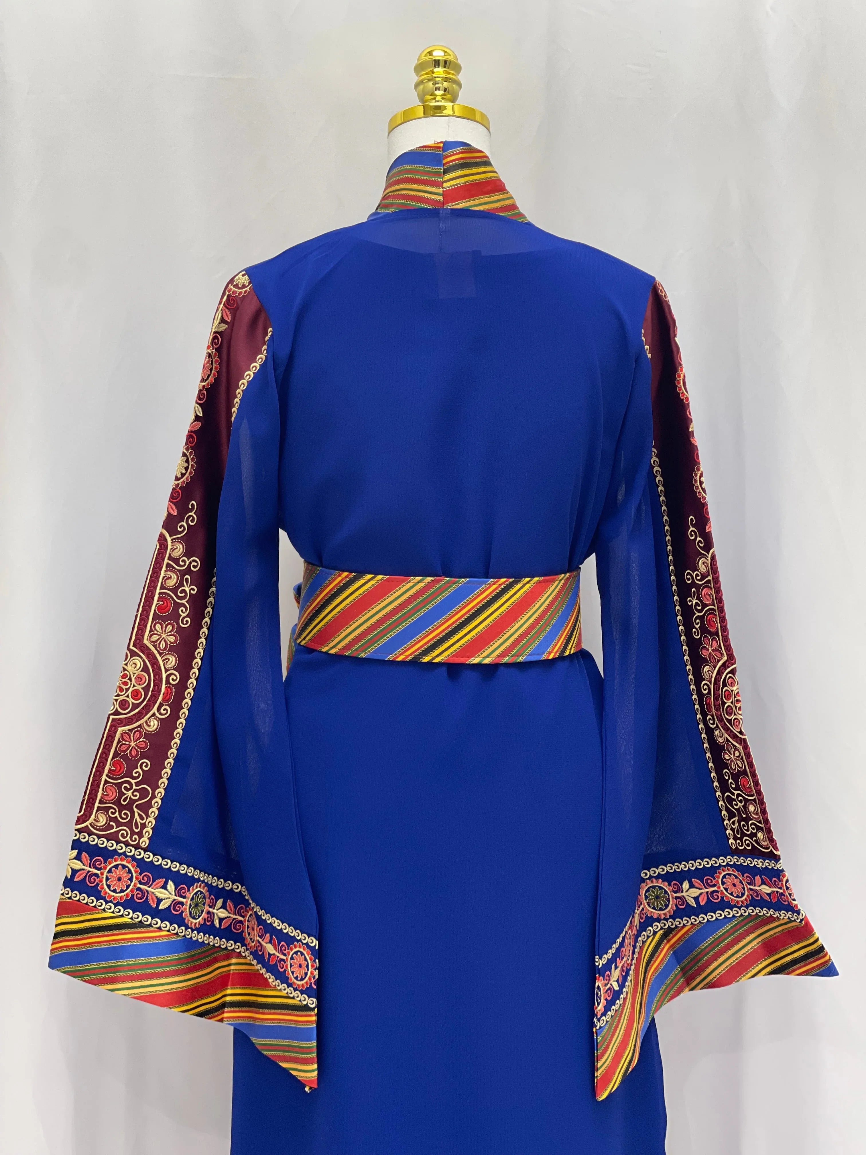 Palestinian Elegance embroidered Kashmir abaya in blue with colorful striped and intricate embroidery on sleeves and collar