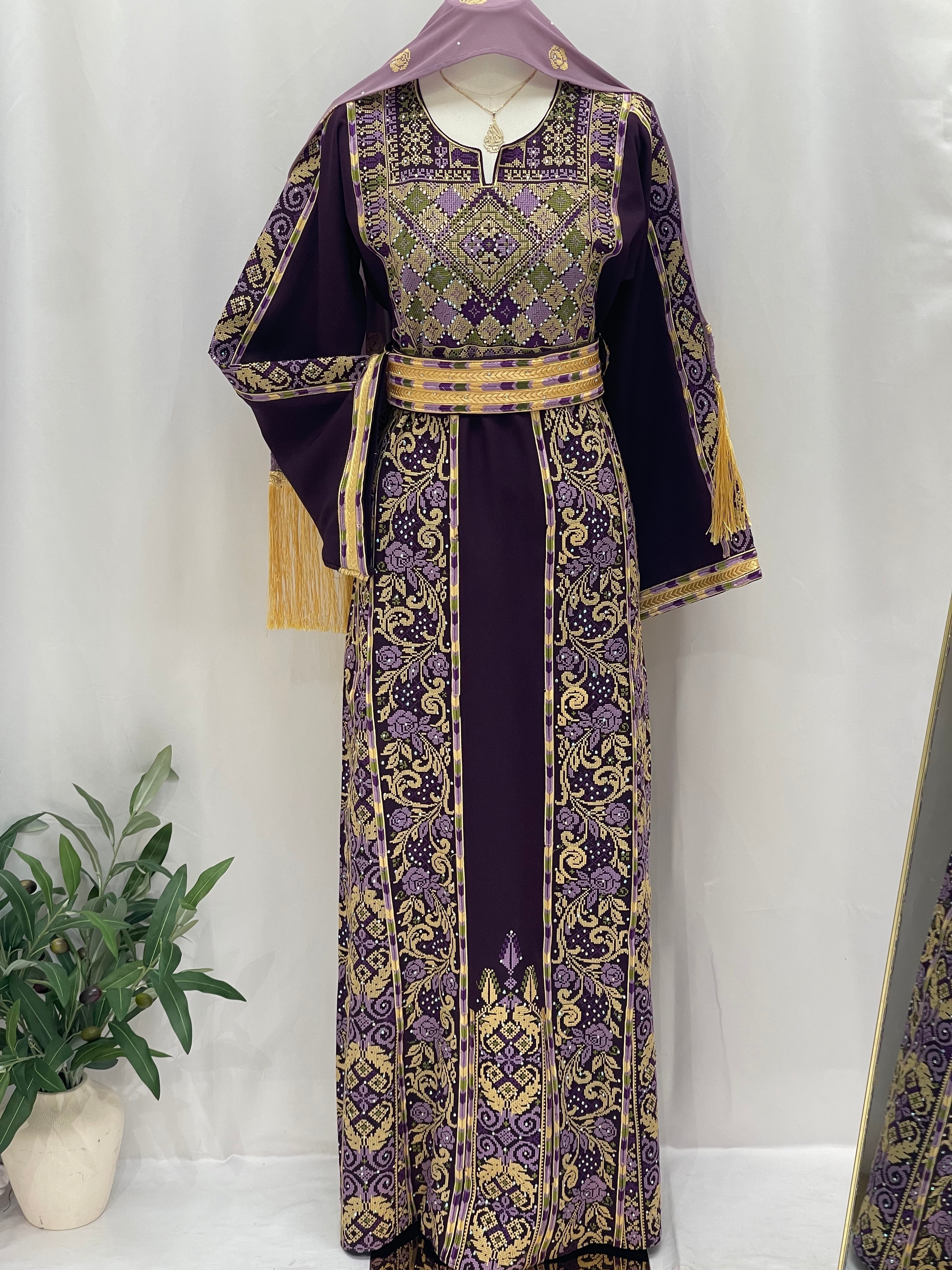 Arjwan Embroidered Thoub in rich purple with intricate gold patterns and elegant fringes