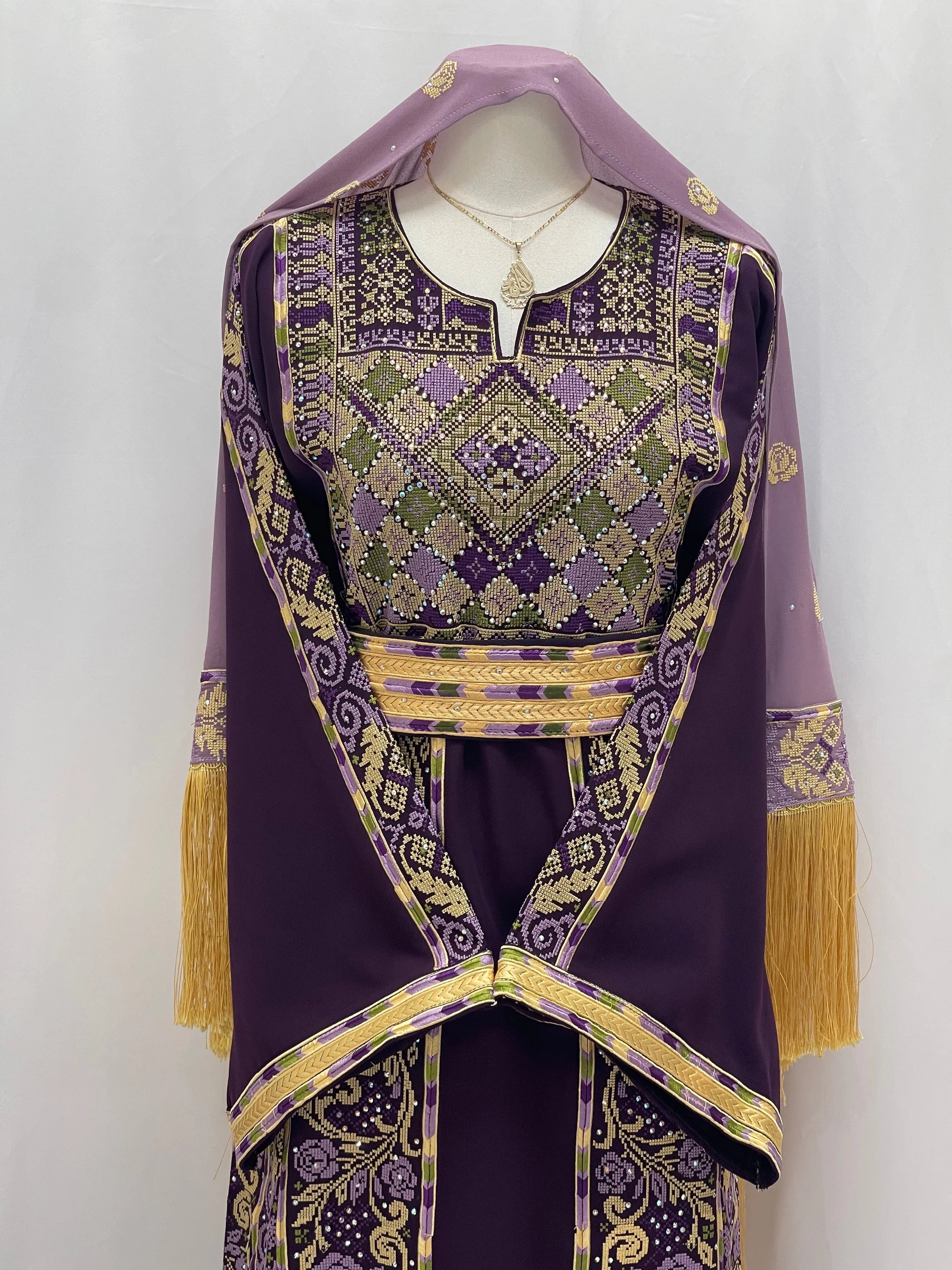 Arjwan Embroidered Thoub in purple with intricate patterns and detailed fringes for elegant occasions