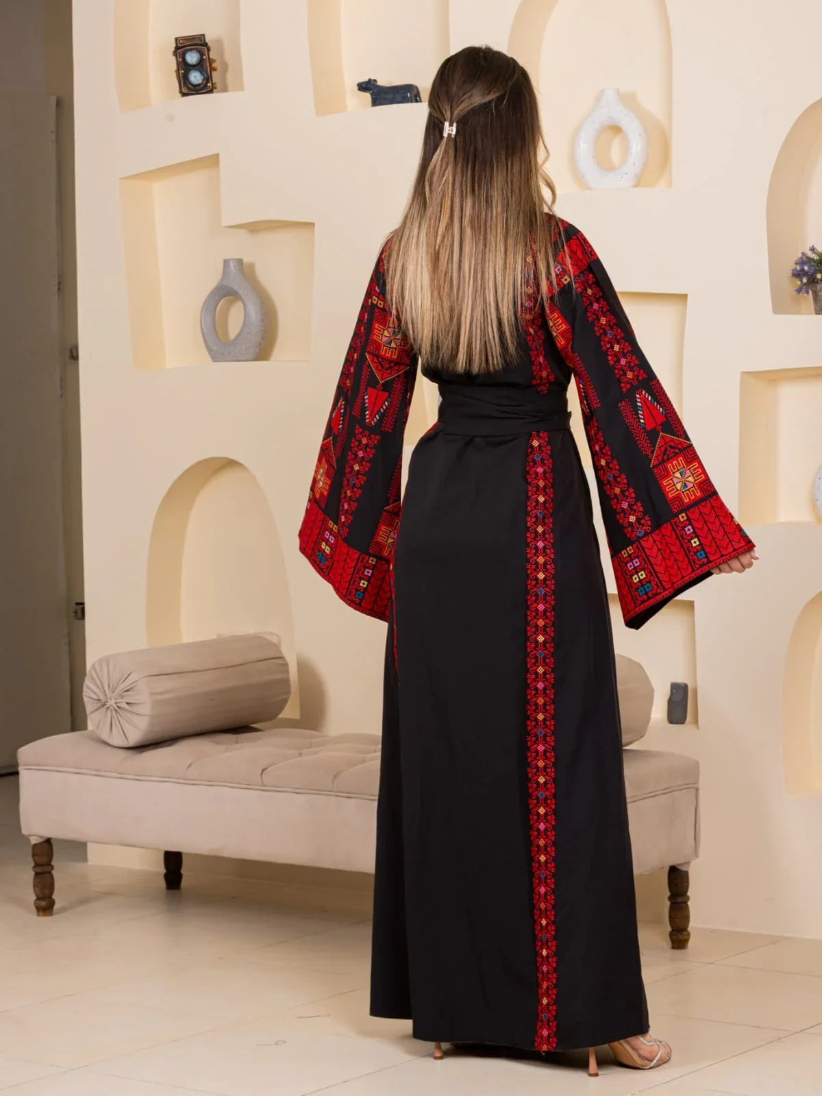 Asala Embroidered Thoub by Palestinian Elegance long black thobe with red embroidered back panel and wide sleeves