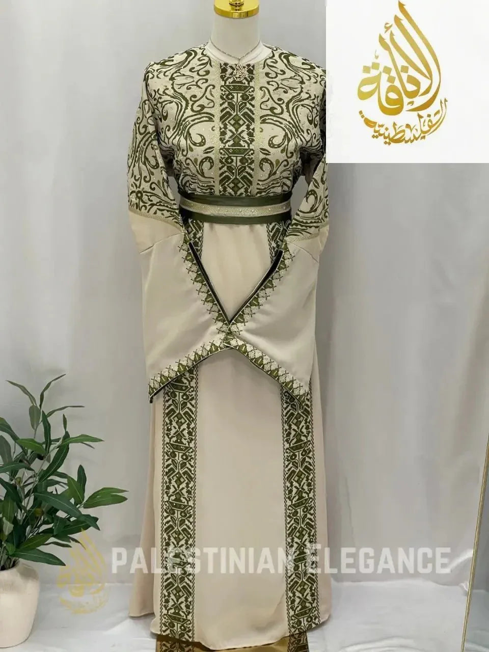 Palestinian Elegance beige dress with detailed green embroidery Palestinian embroidered thoub on mannequin