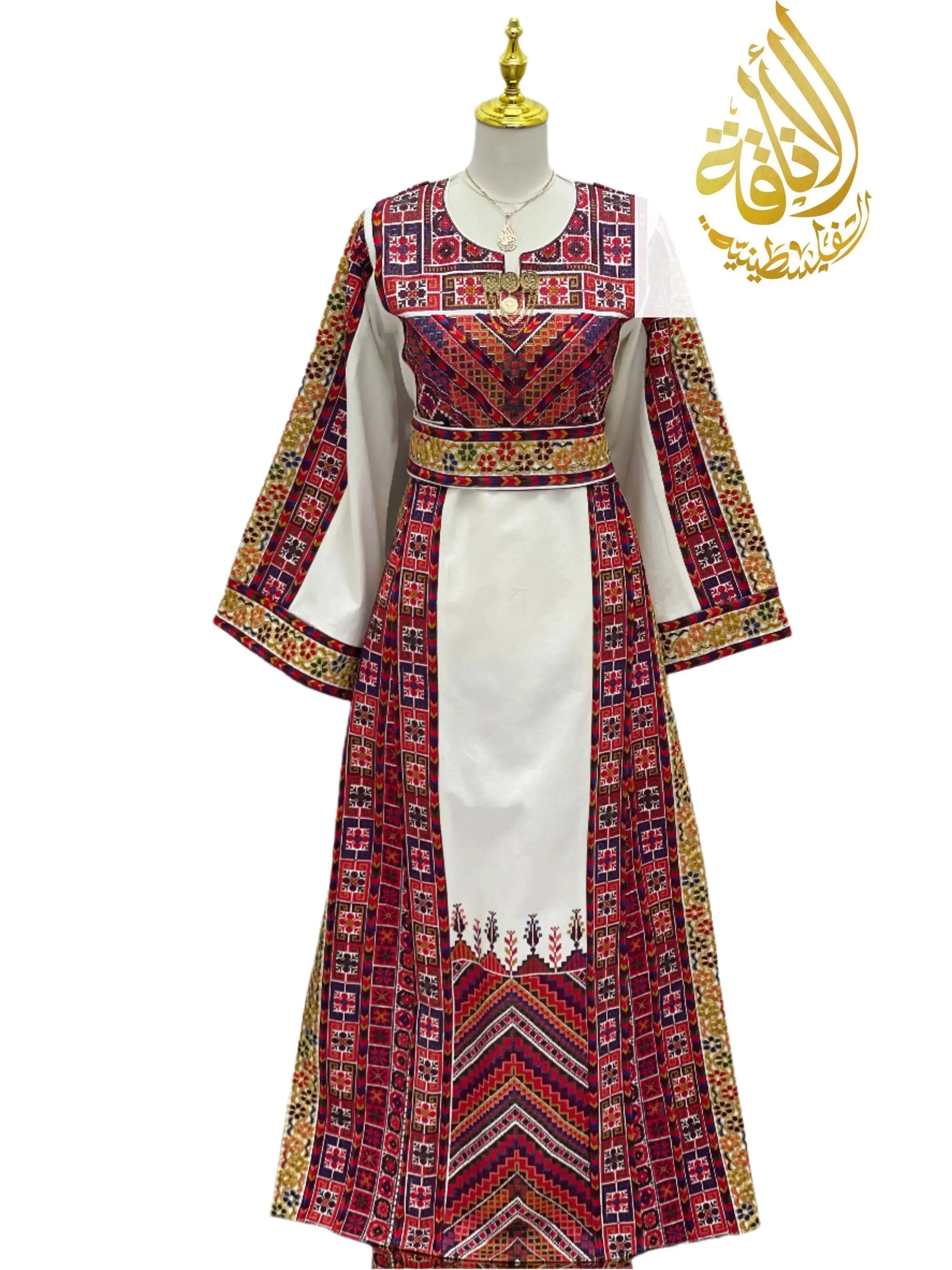 Azhar Atameen Embroidered Thoub by Palestinian Elegance featuring traditional red and white geometric patterns with gold accents