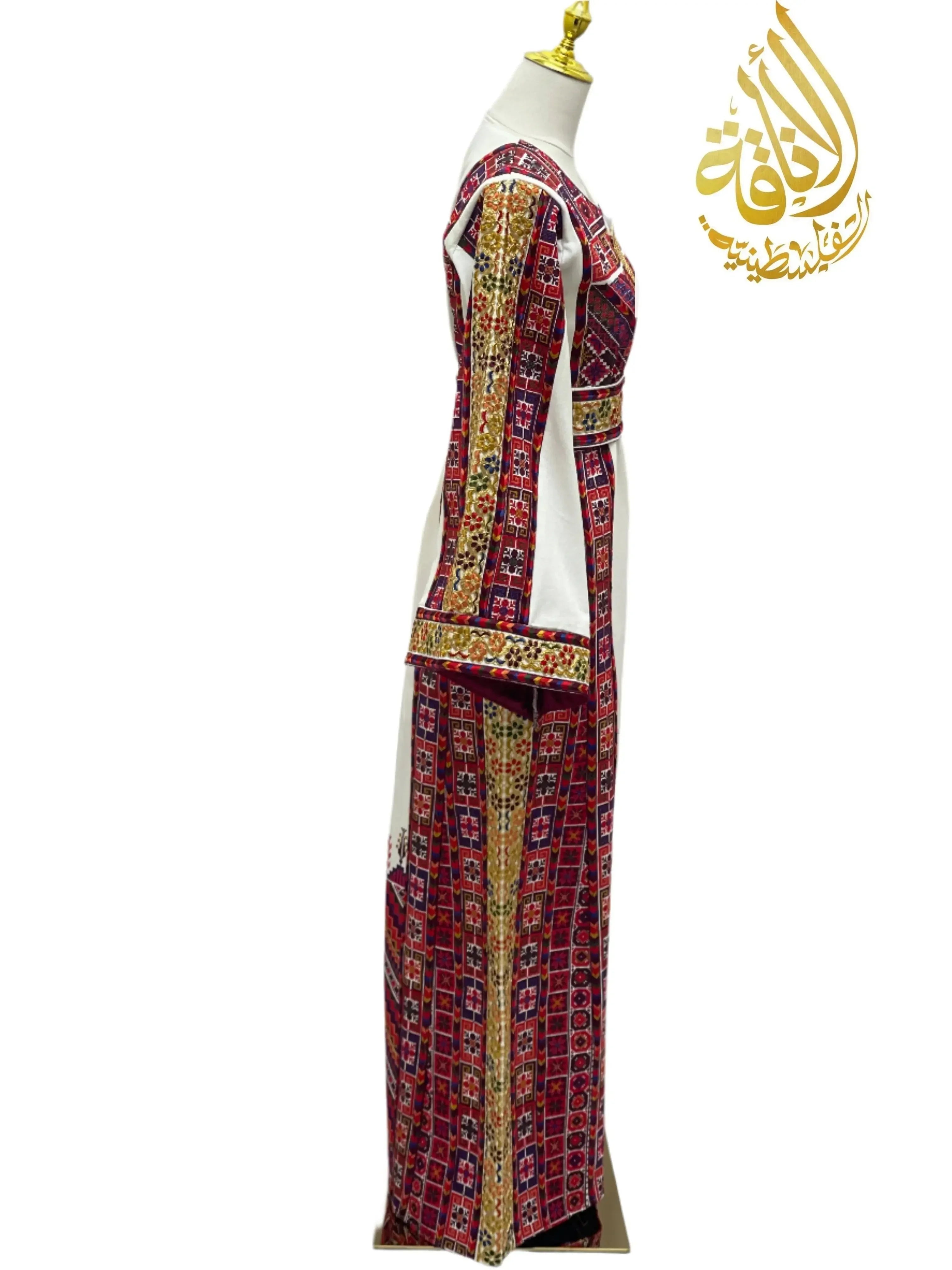 Side view of Azhar Atameen Embroidered Thoub by Palestinian Elegance featuring intricate red and gold embroidery