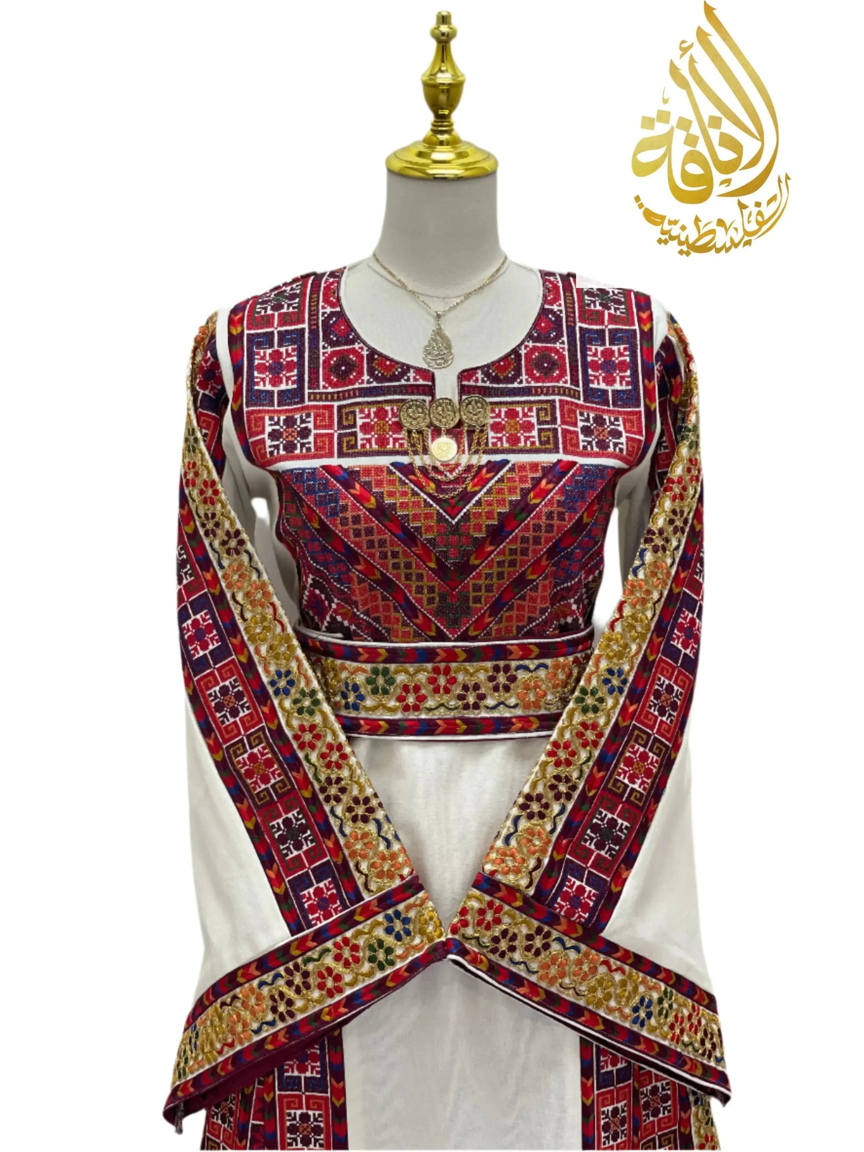 Palestinian Elegance Azhar Atameen Embroidered Thoub with intricate red and gold traditional embroidery on white fabric