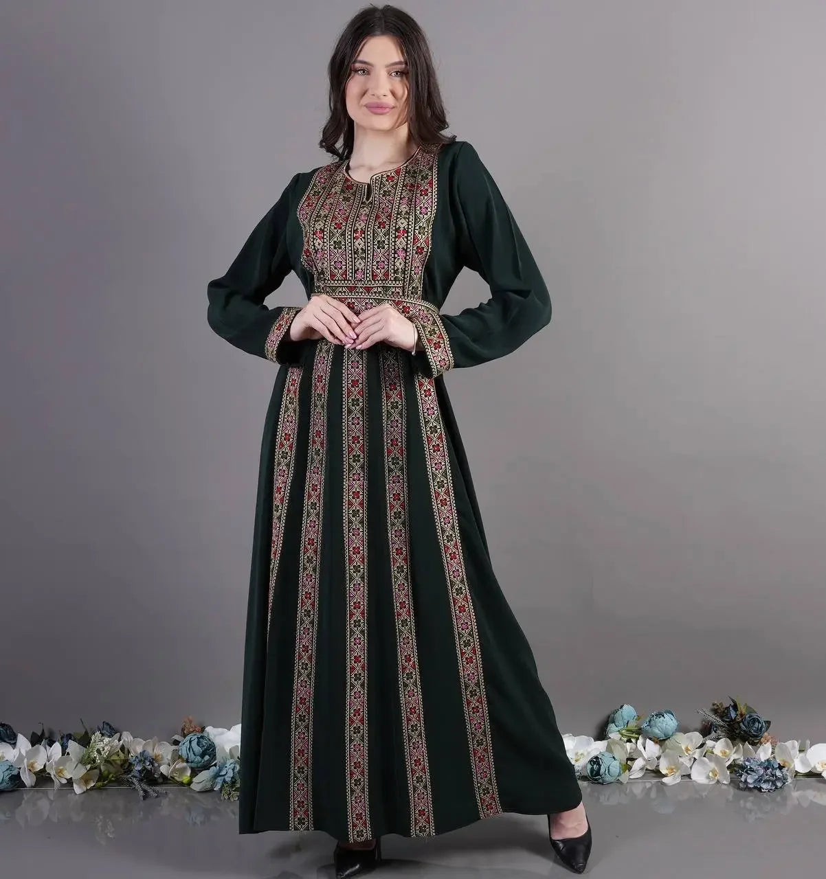 Palestinian Elegance embroidered abaya dress in dark green with traditional detailed embroidery on front and sleeves