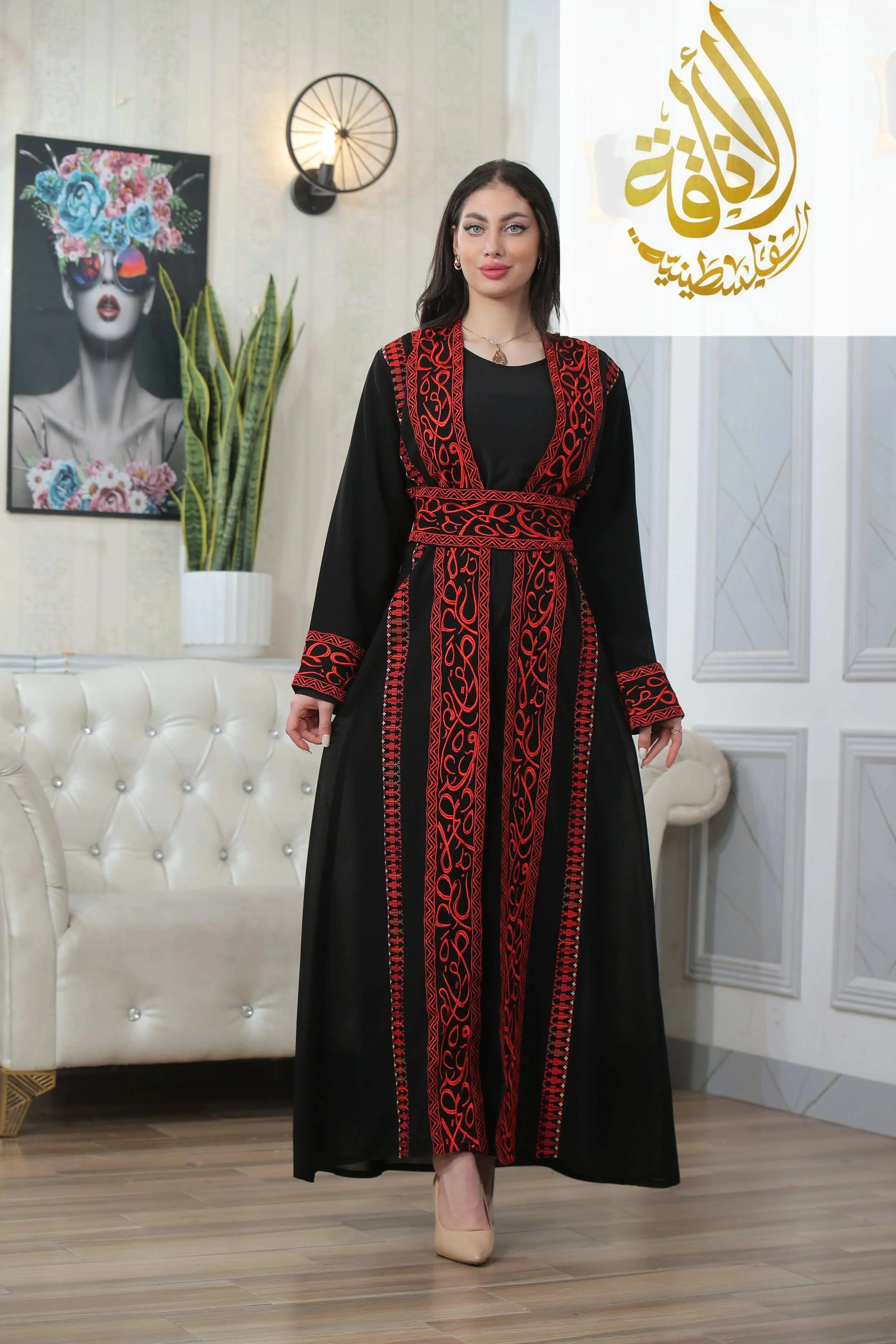 Basma Arabic letters with heritage embroidery Bisht black thoub with red intricate designs by Palestinian Elegance