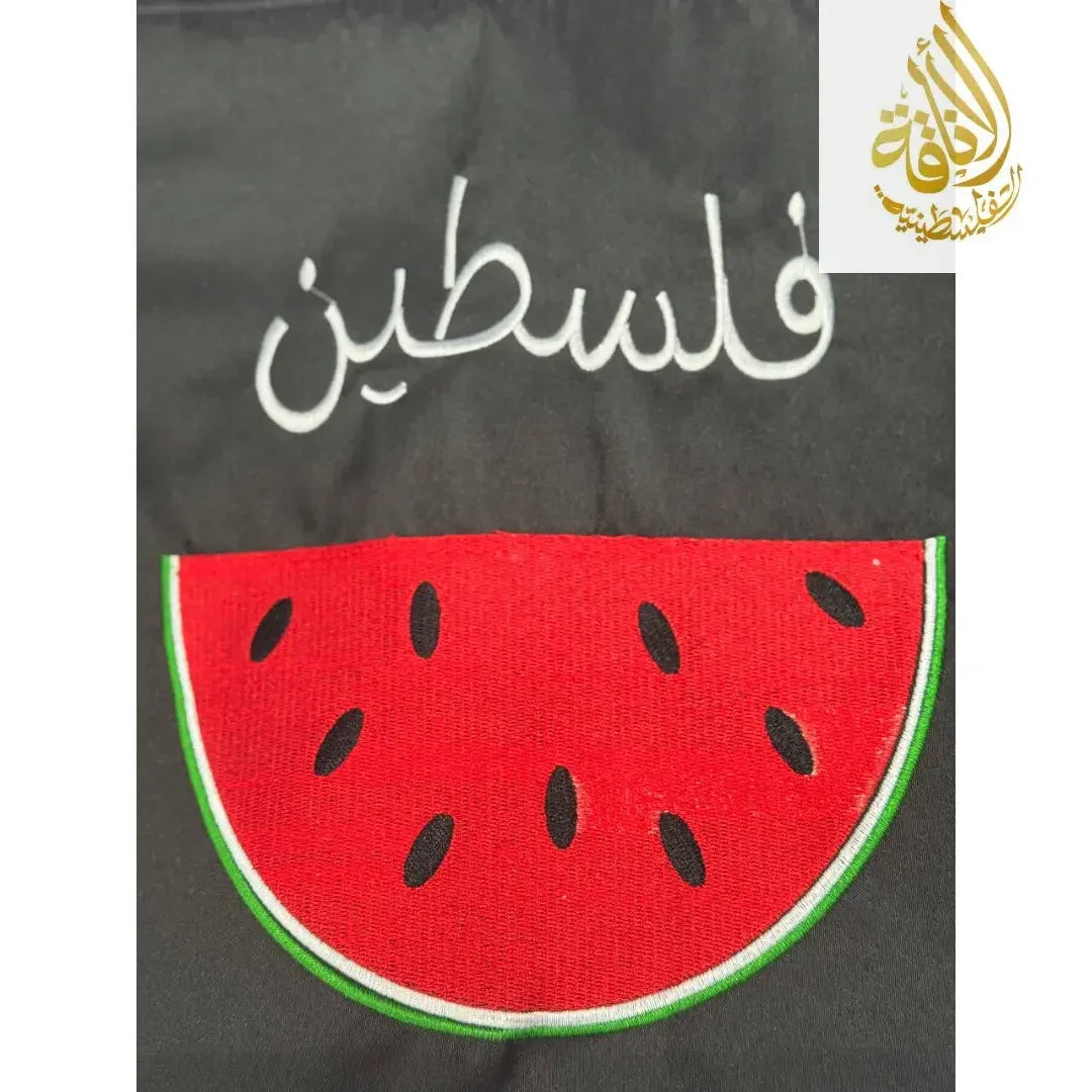 Palestine tote bag by Palestinian Elegance with embroidered Arabic text and watermelon design