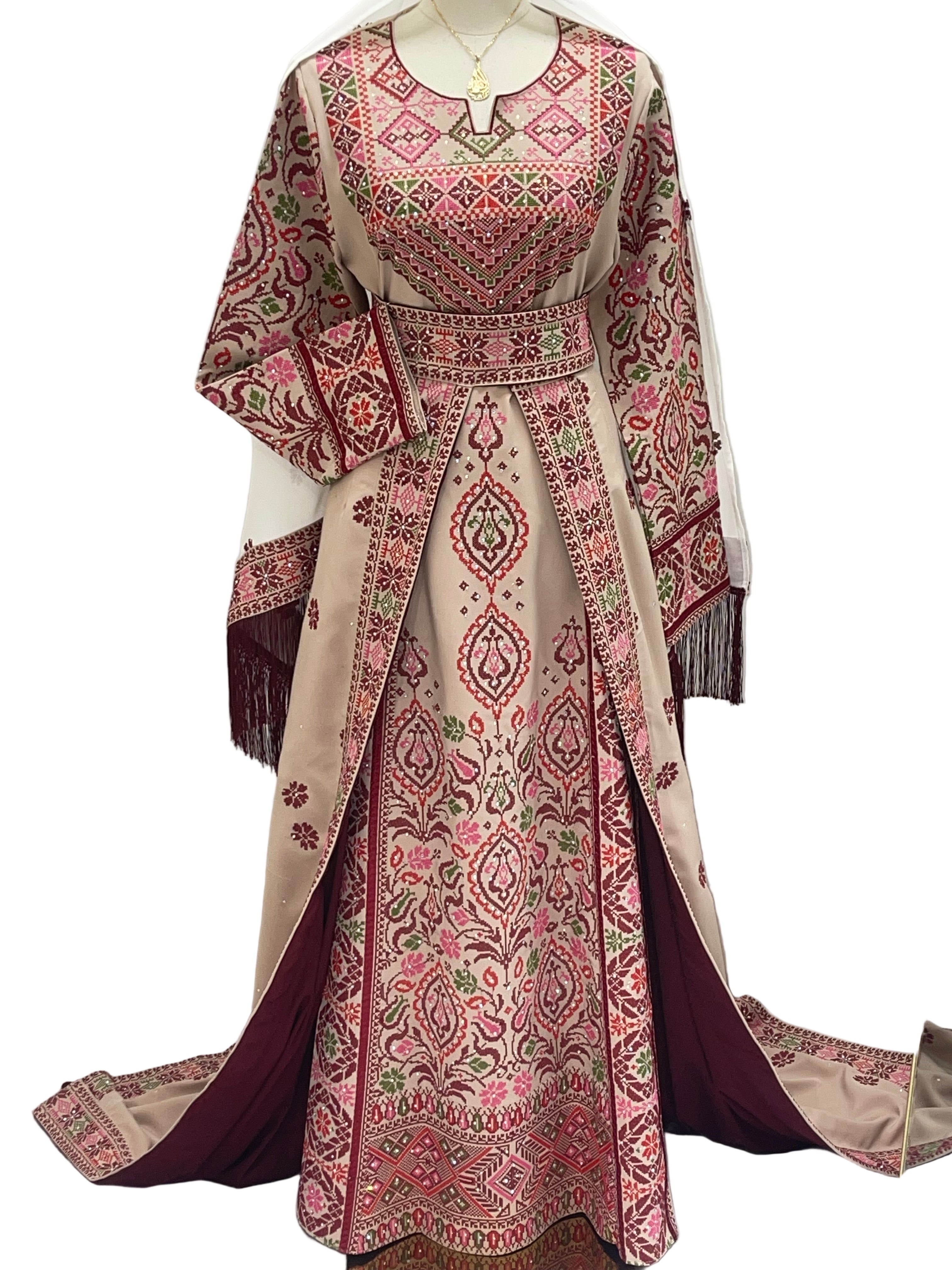 Bride of Roses Thobe featuring intricate embroidery and elegant design for traditional occasions