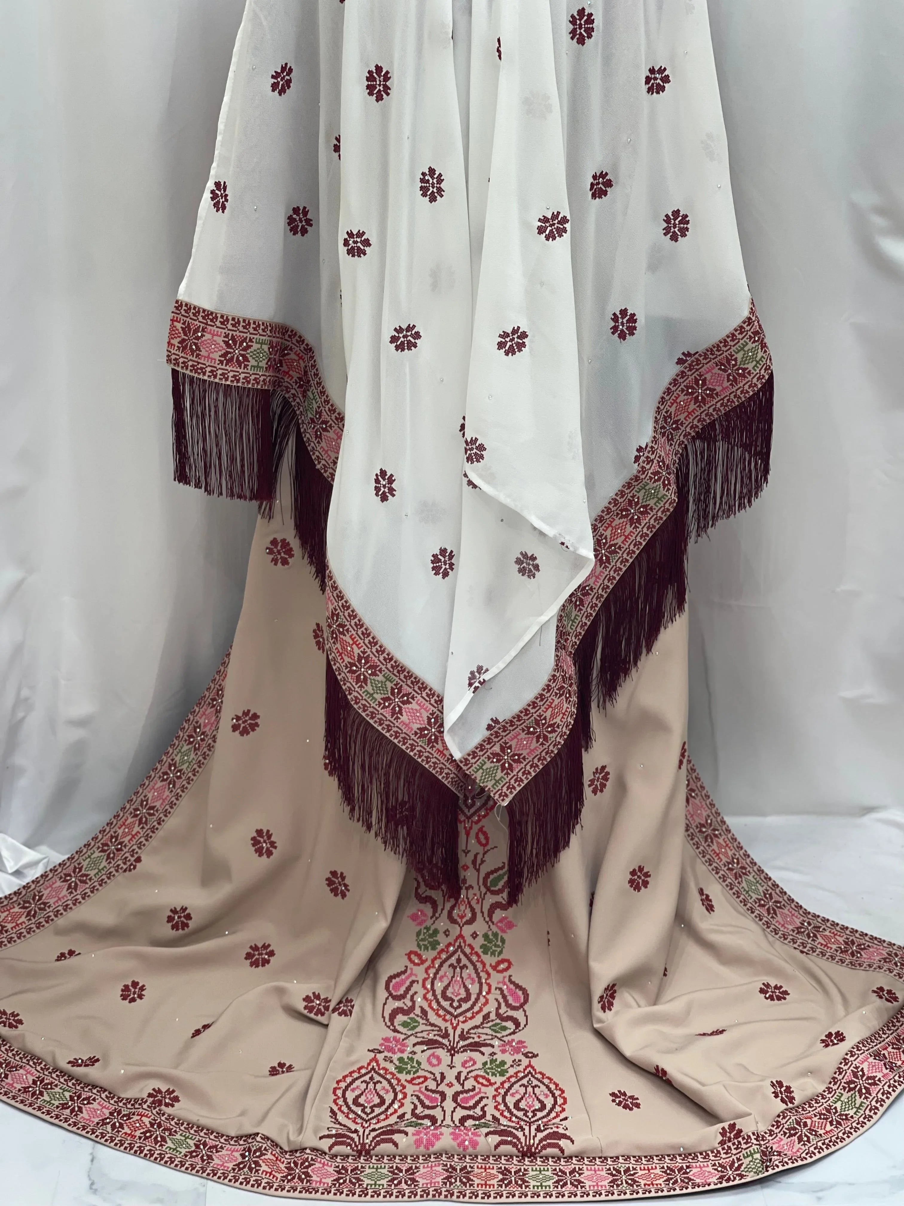 Bride of Roses Thobe featuring elegant embroidery and fringed details for traditional bridal wear