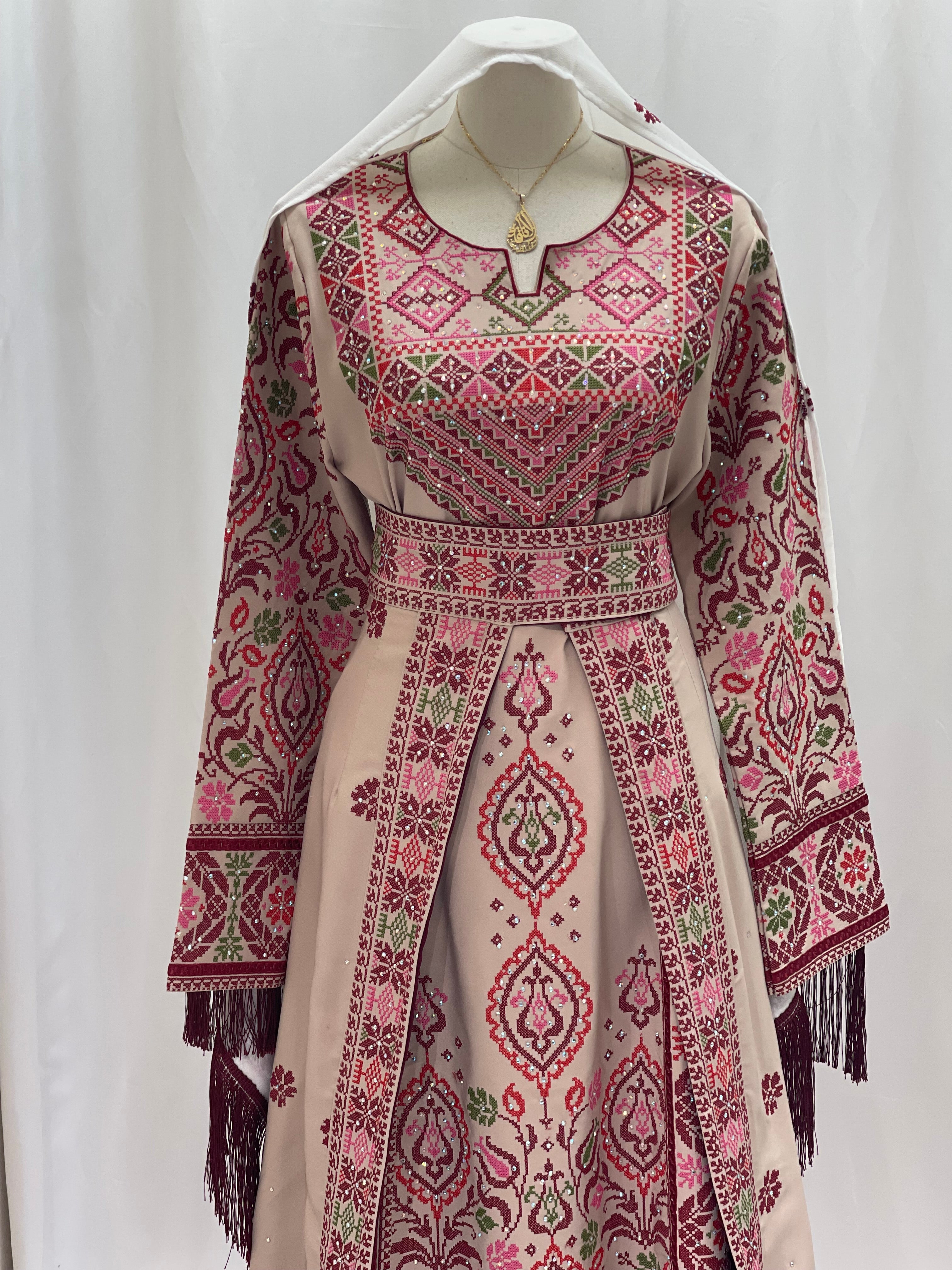 Bride of Roses Thobe featuring intricate embroidery and elegant design for special occasions