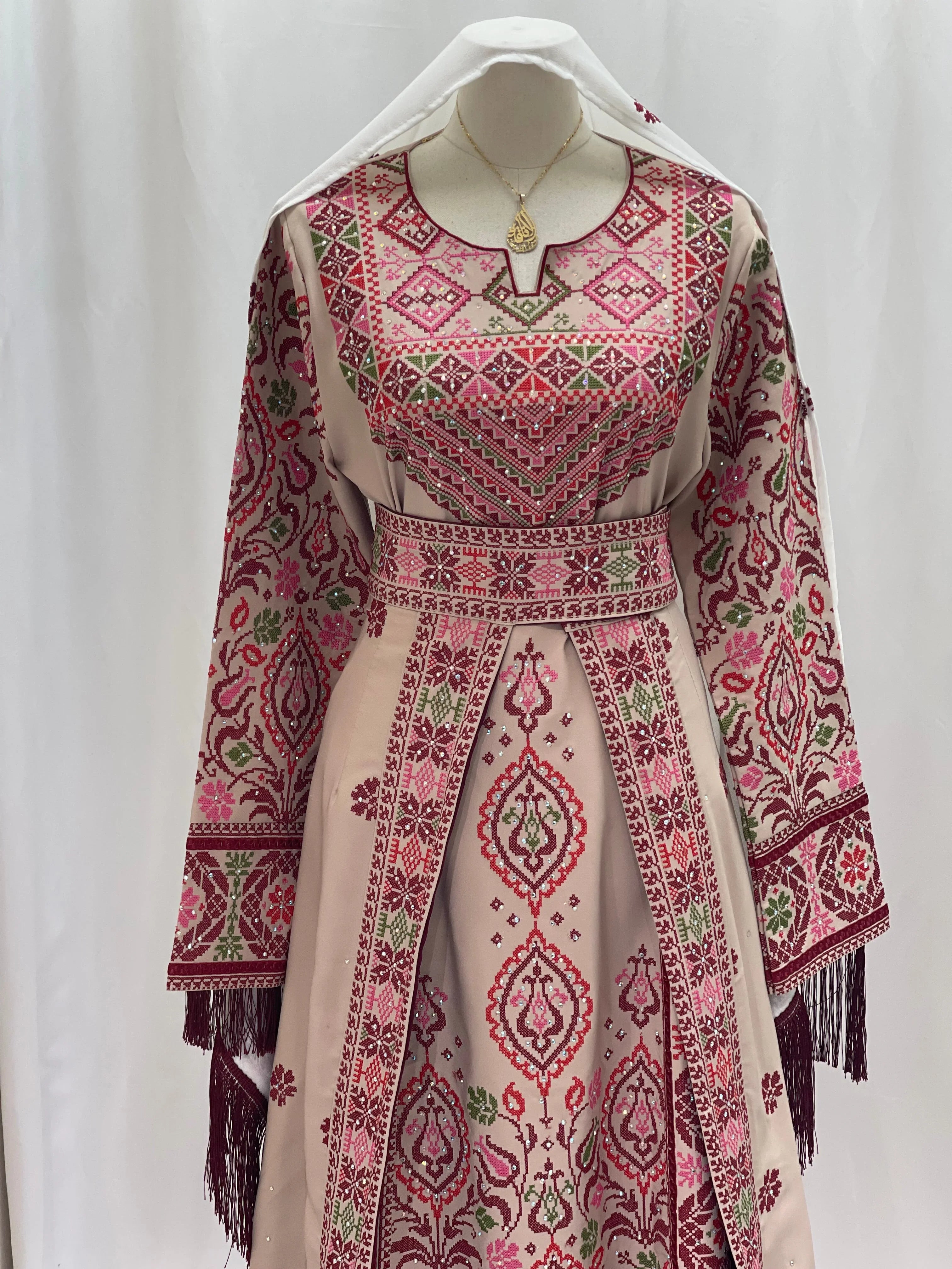 Bride of Roses Thobe featuring intricate embroidery and elegant design for special occasions