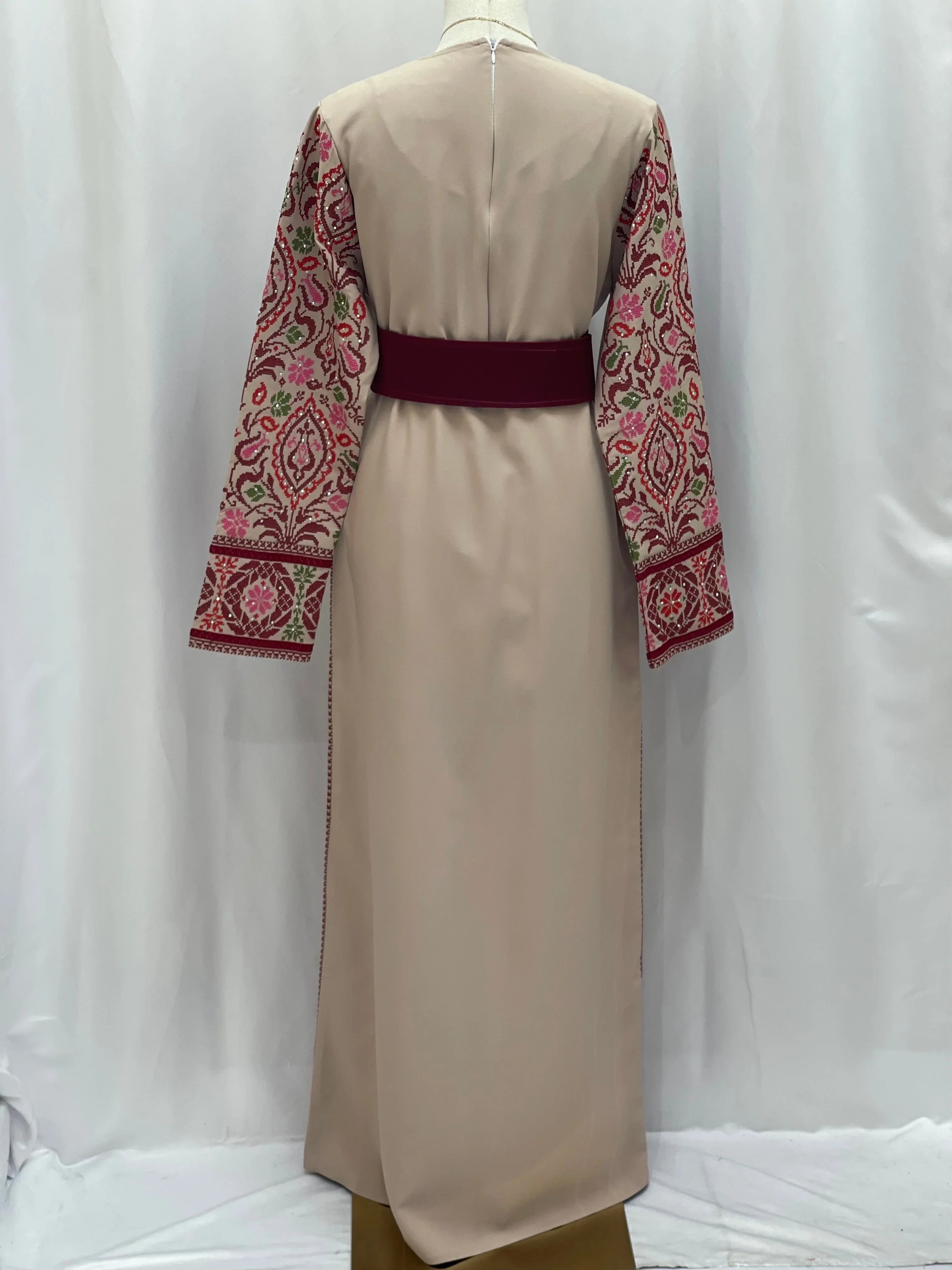 Back view of the Bride of Roses Thobe with intricate embroidered sleeves in floral patterns