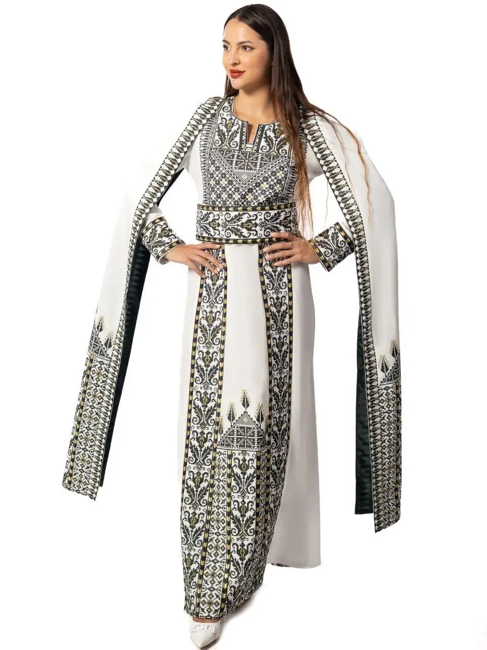 Embroidered Palestinian thobe dress with detailed black and white traditional patterns from Palestinian Elegance