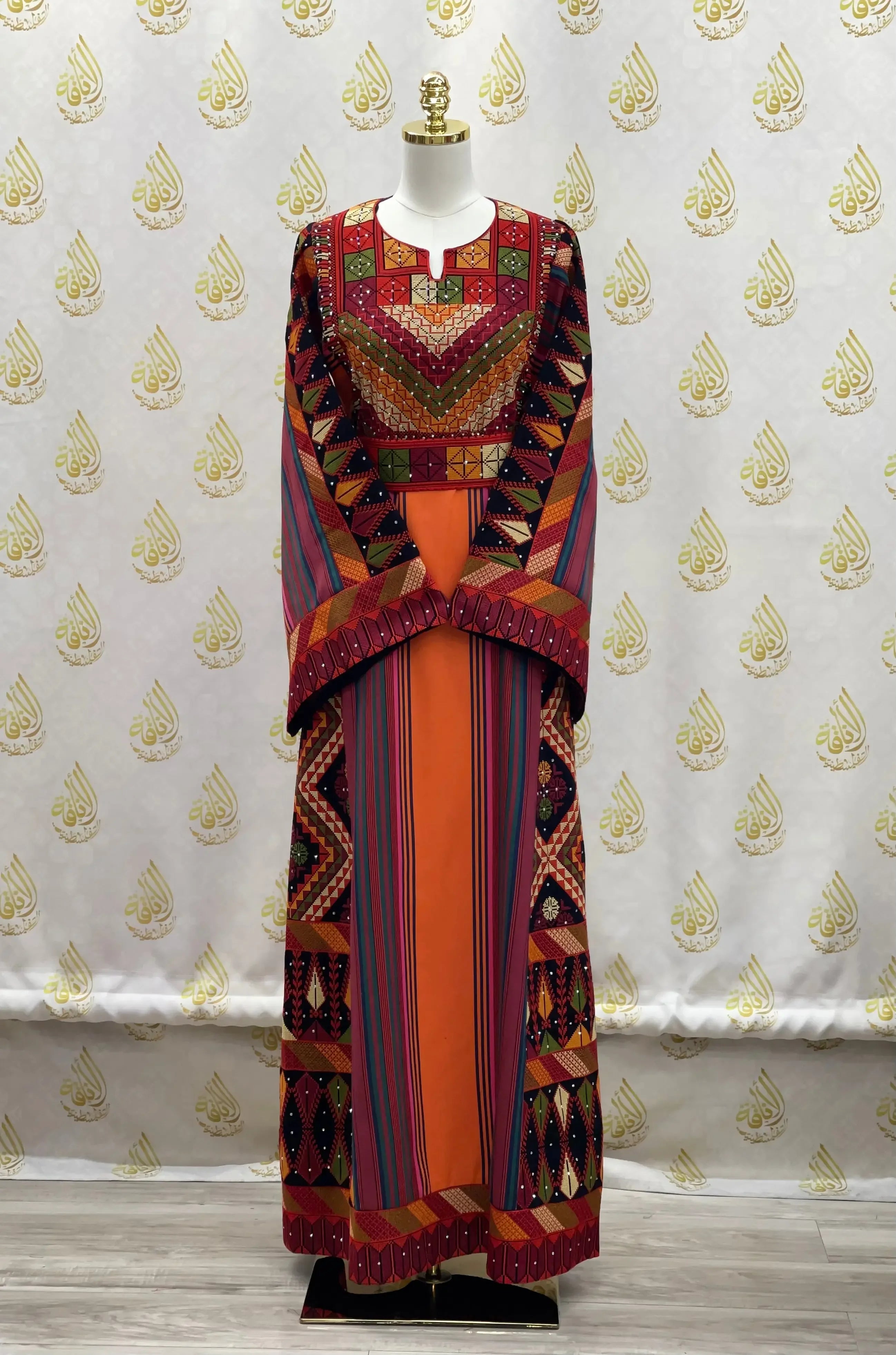 Luxury Palestinian thoub dress with intricate colorful embroidery from Palestinian Elegance