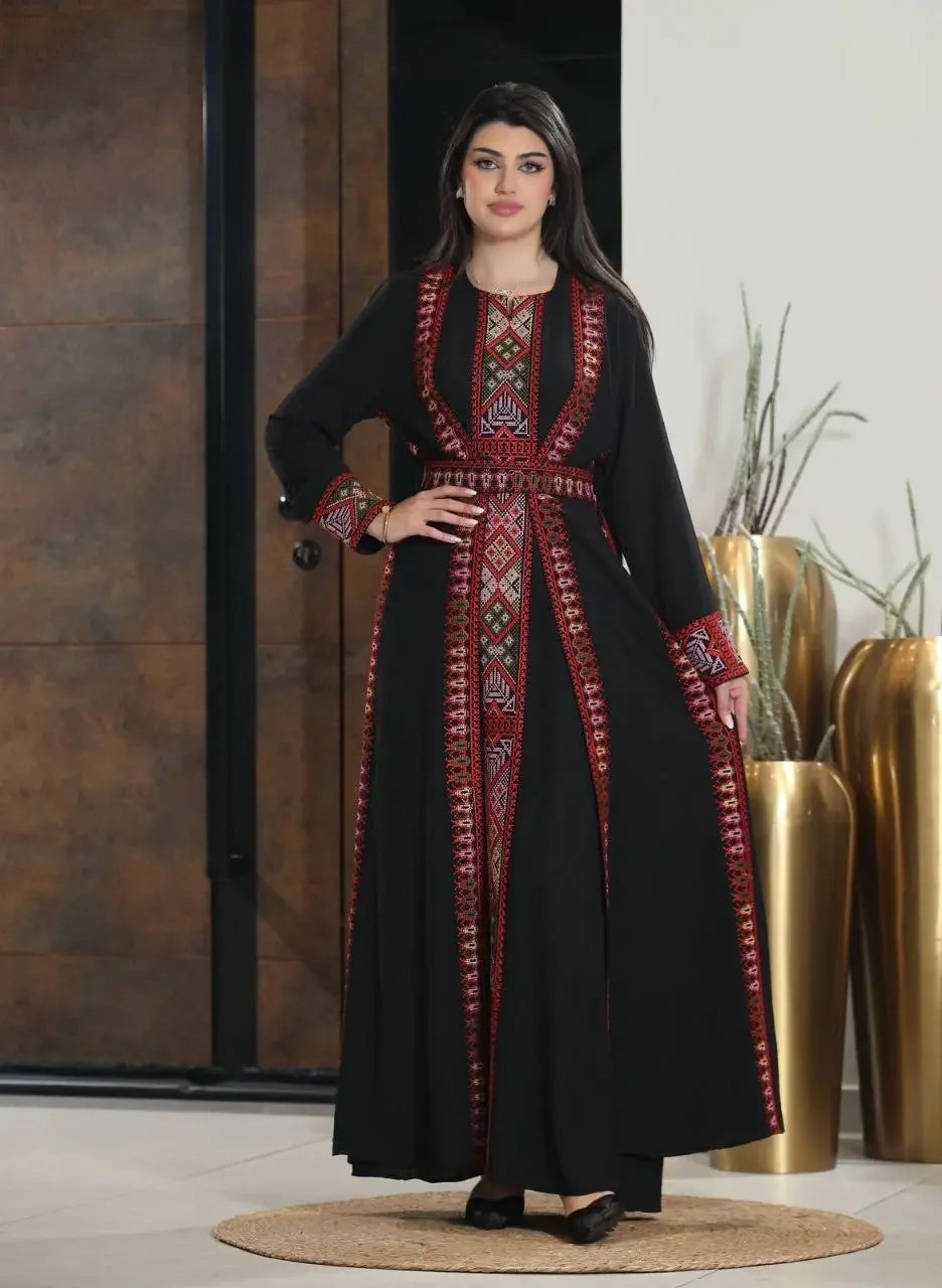 Palestinian Elegance embroidered abaya for women featuring traditional red and white patterns on black fabric
