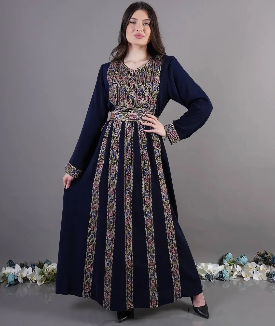 Palestinian Elegance embroidered abaya dress in navy blue with intricate traditional patterns and long sleeves