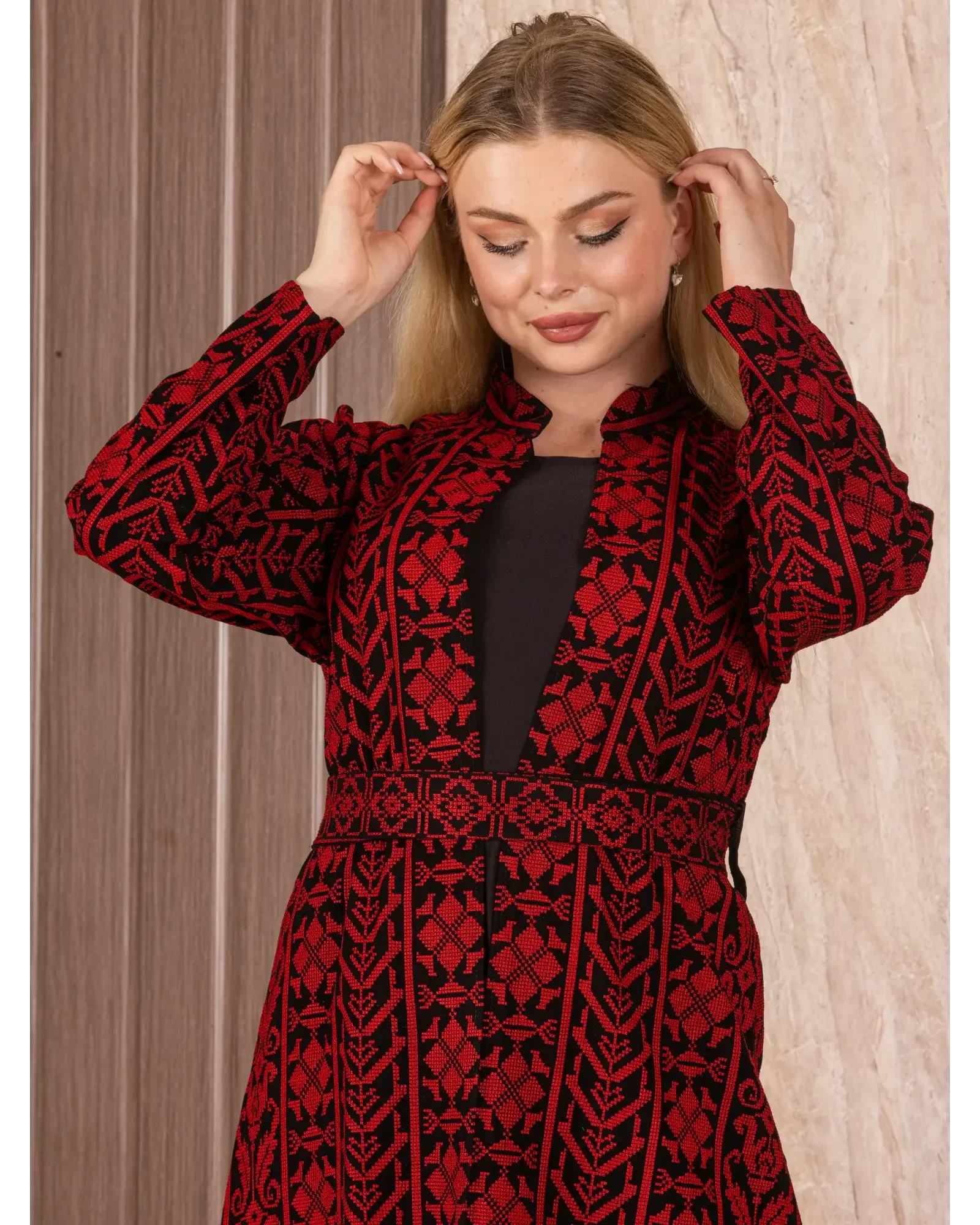 Palestinian Elegance embroidered long cardigan in black and red with intricate traditional patterns
