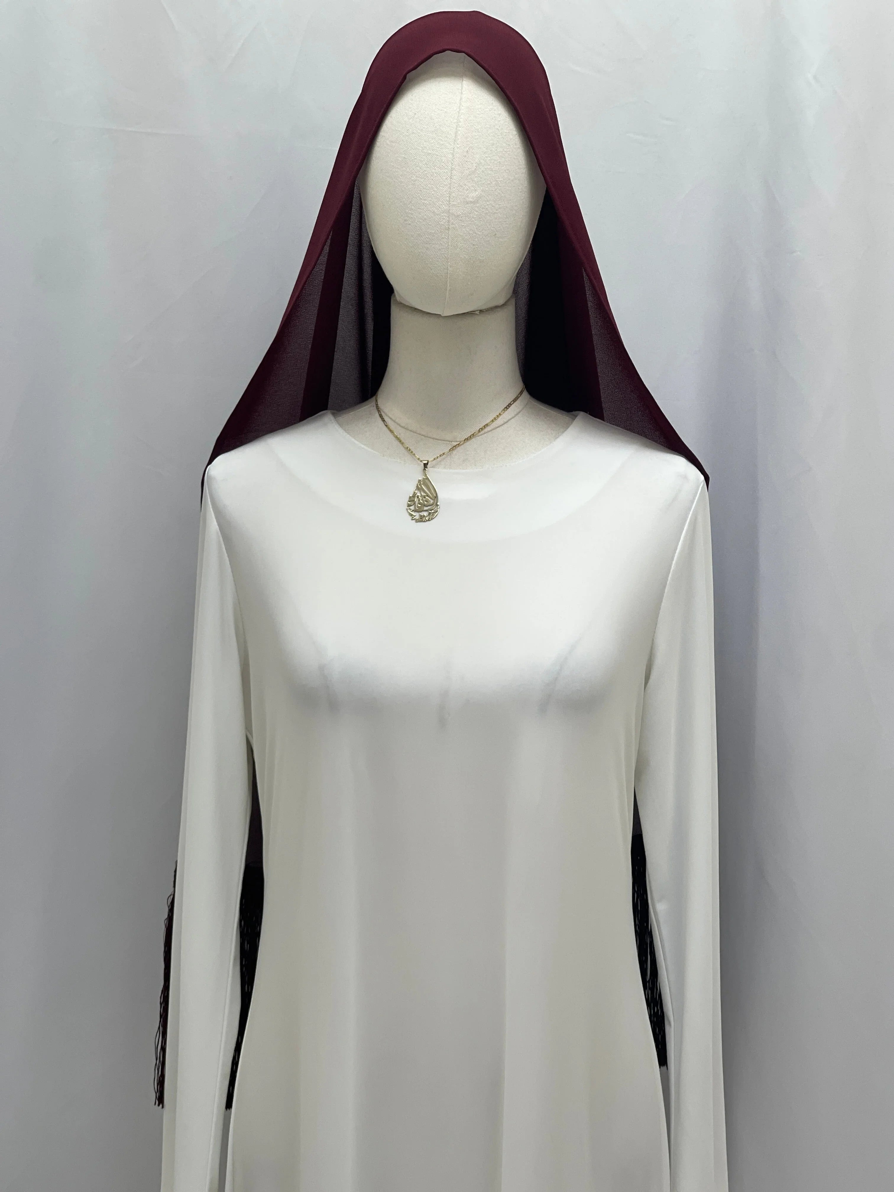 Dark Maroon Khirka With Tassel by Palestinian Elegance on mannequin over white abaya dress