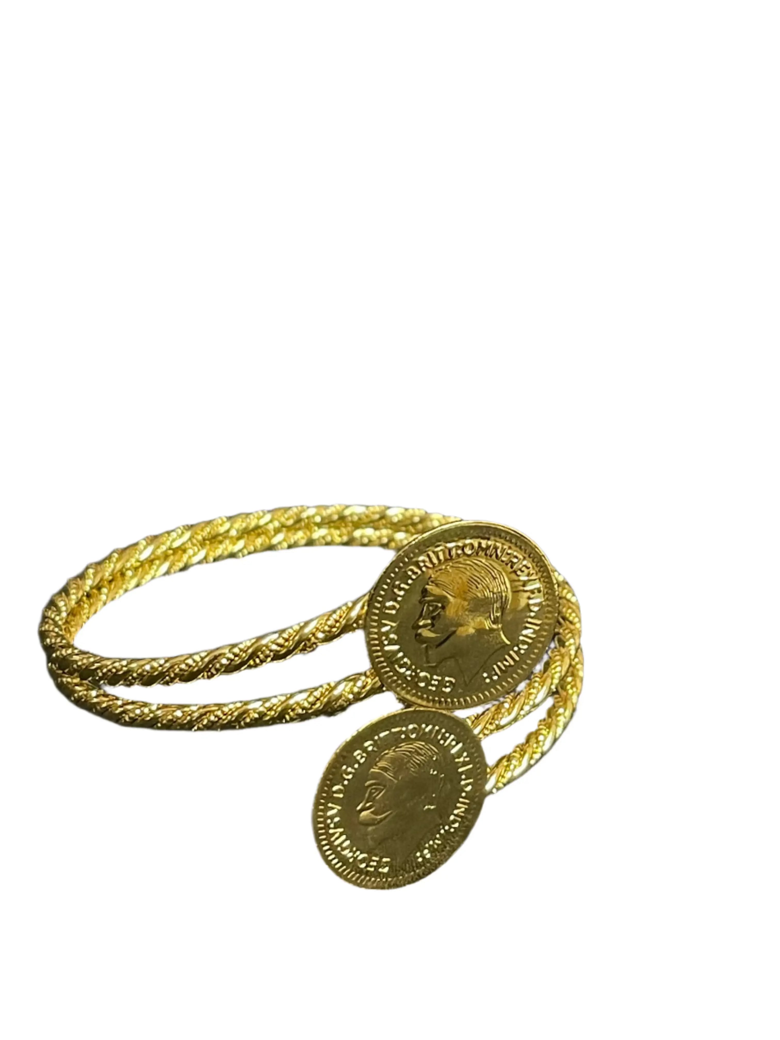 Palestinian Elegance heritage inspired gold bracelet with coin charms and twisted band design