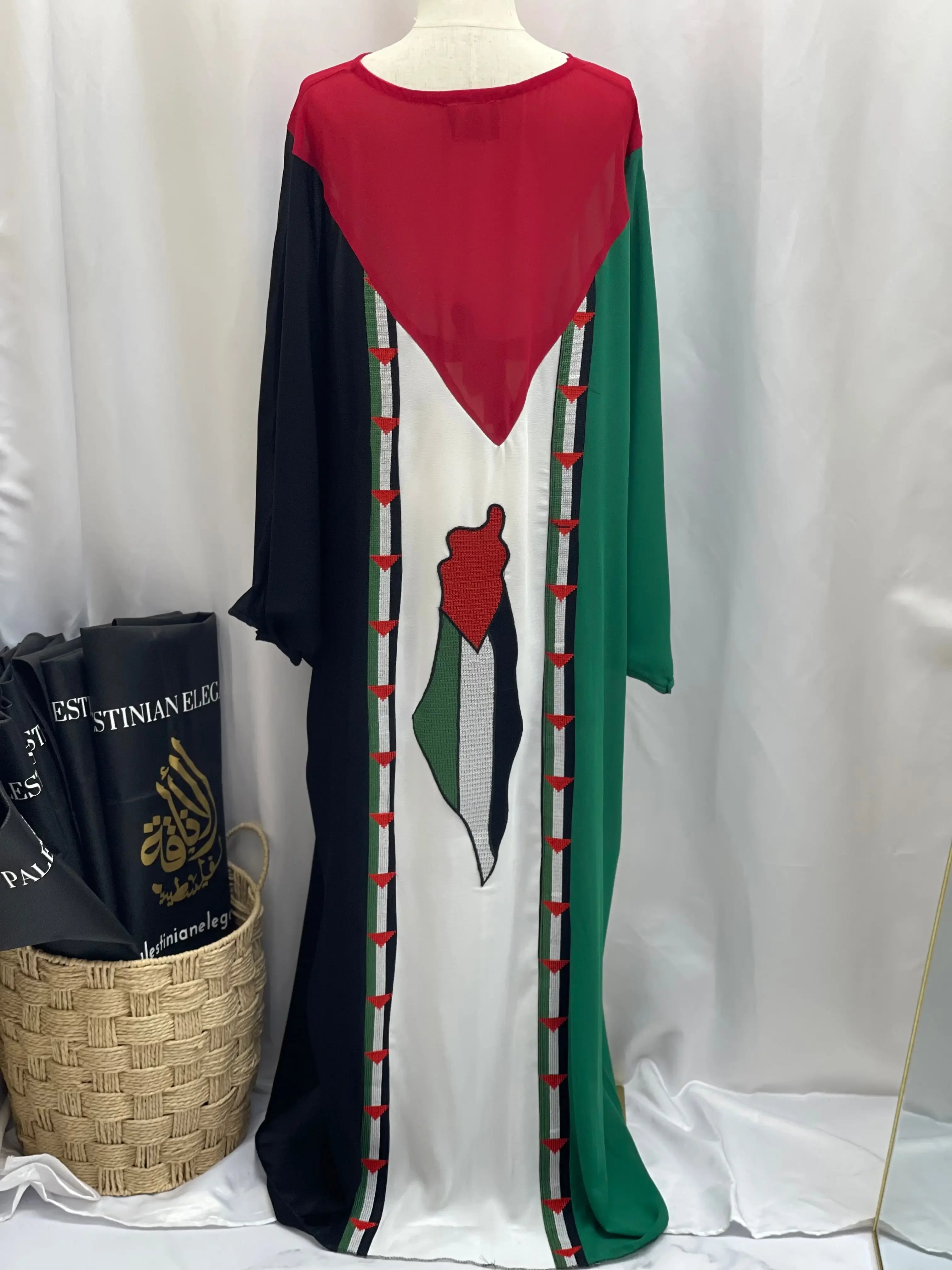 Palestinian Elegance casual Palestinian flag dress with red, black, green, and white colors on mannequin