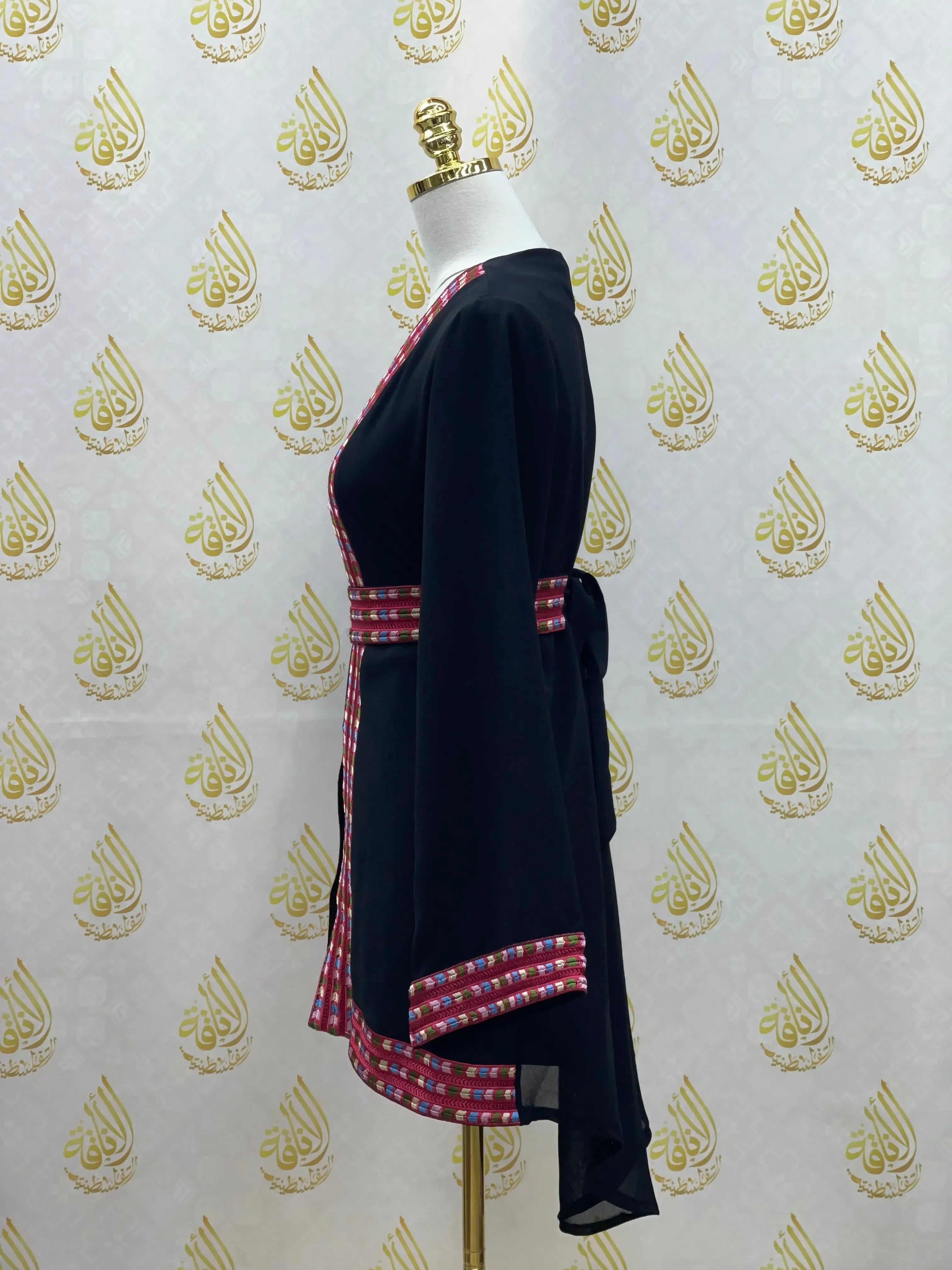 Palestinian Elegance embroidered chiffon kimono cardigan with detailed pink and white embroidery on black fabric