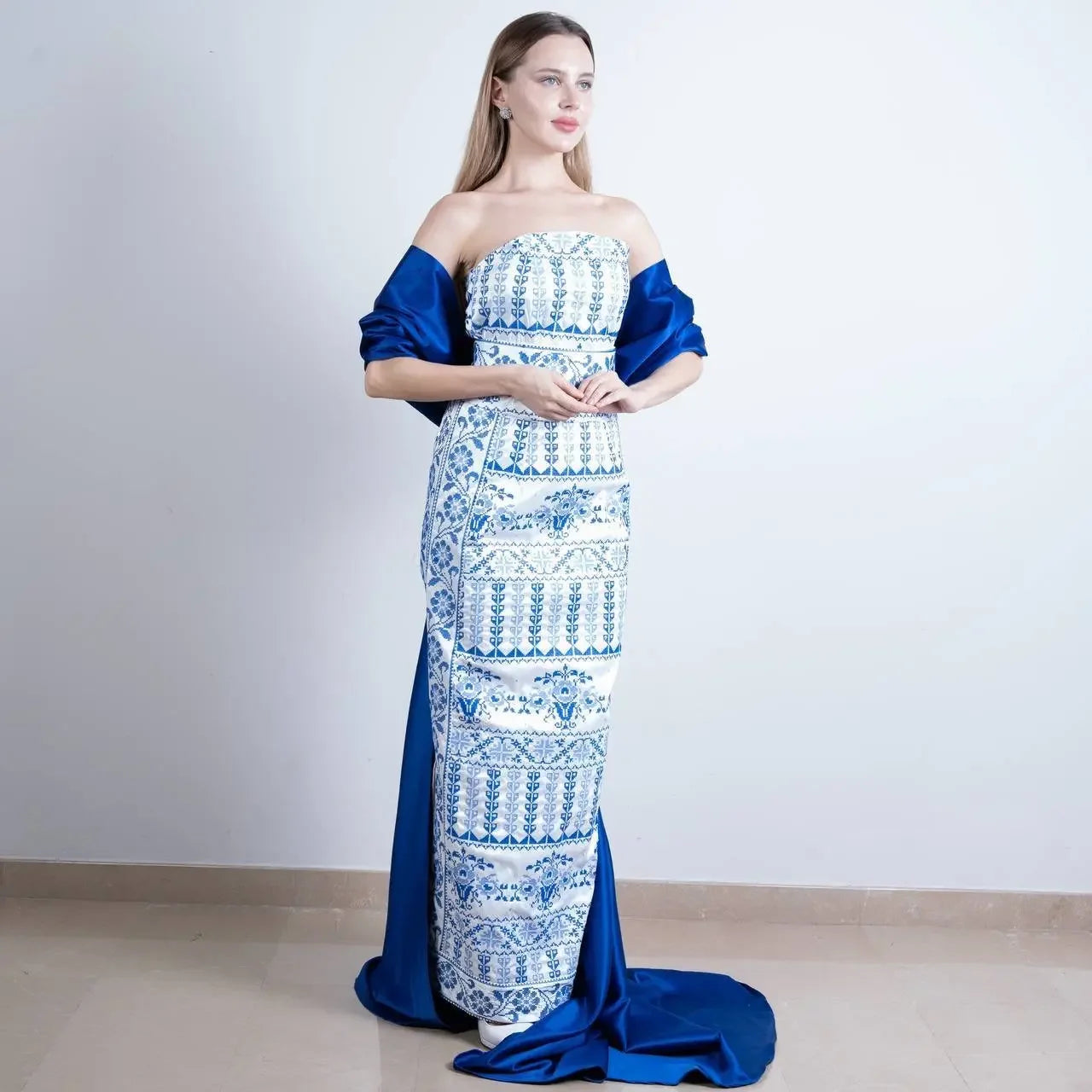 Embroidered Strapless Dress with Oversized Bow: Elegance and Sophistication Palestinian Elegance