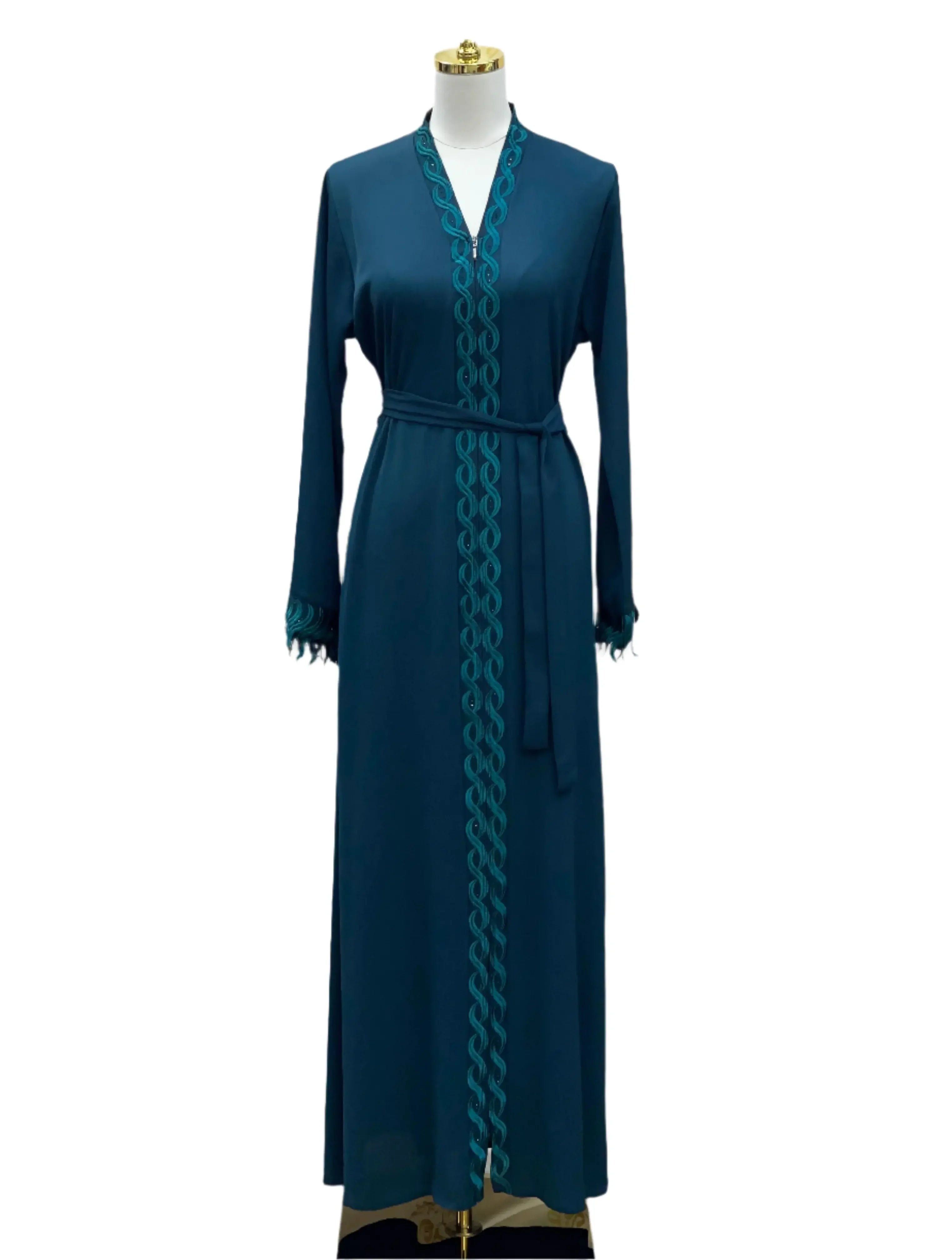 Palestinian Elegance elegant embroidered abaya in deep blue with intricate turquoise embroidery and waist tie