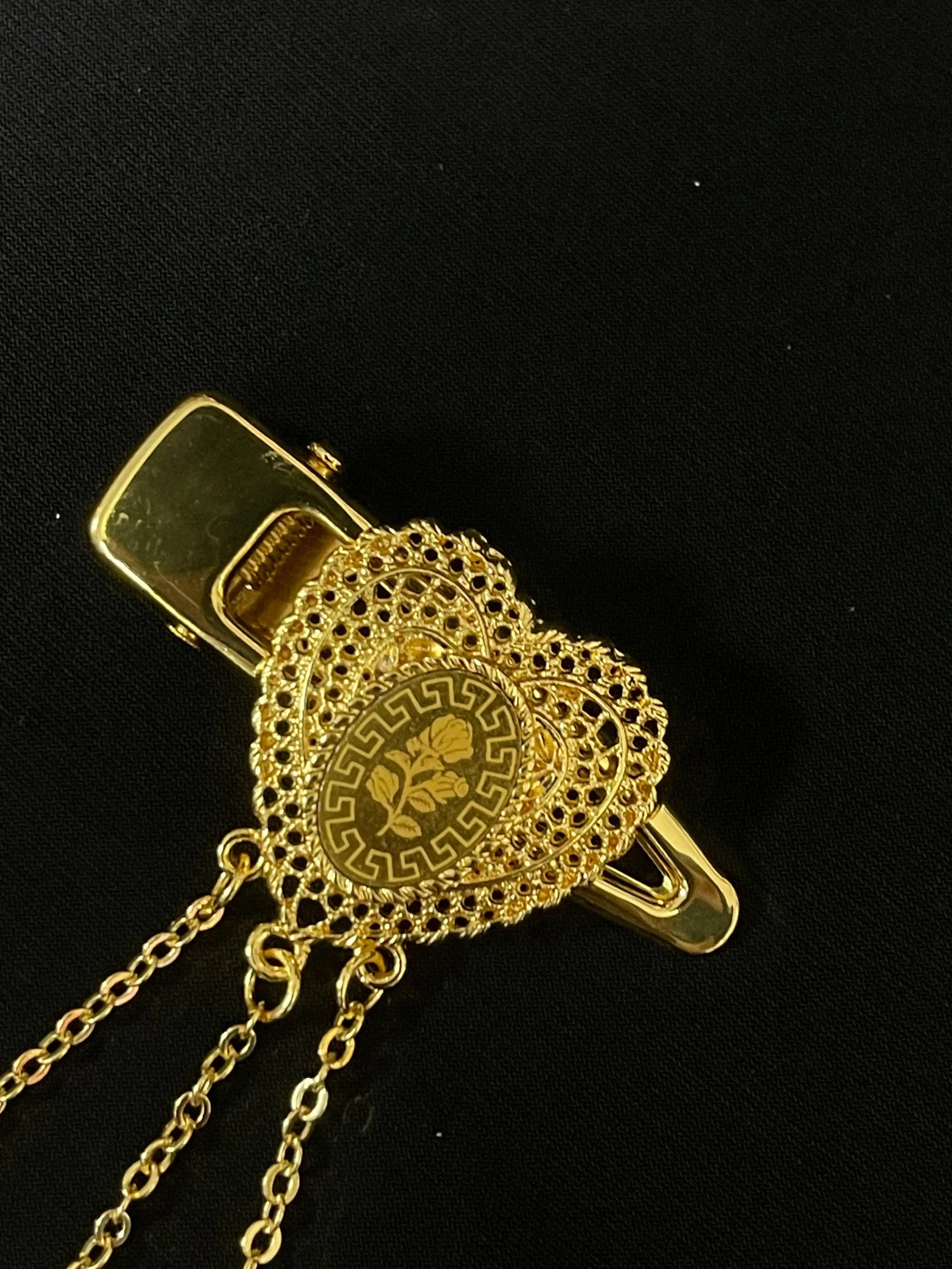 Palestinian Elegance Imitated Gold Hair Clip with intricate heart design and dangling chains