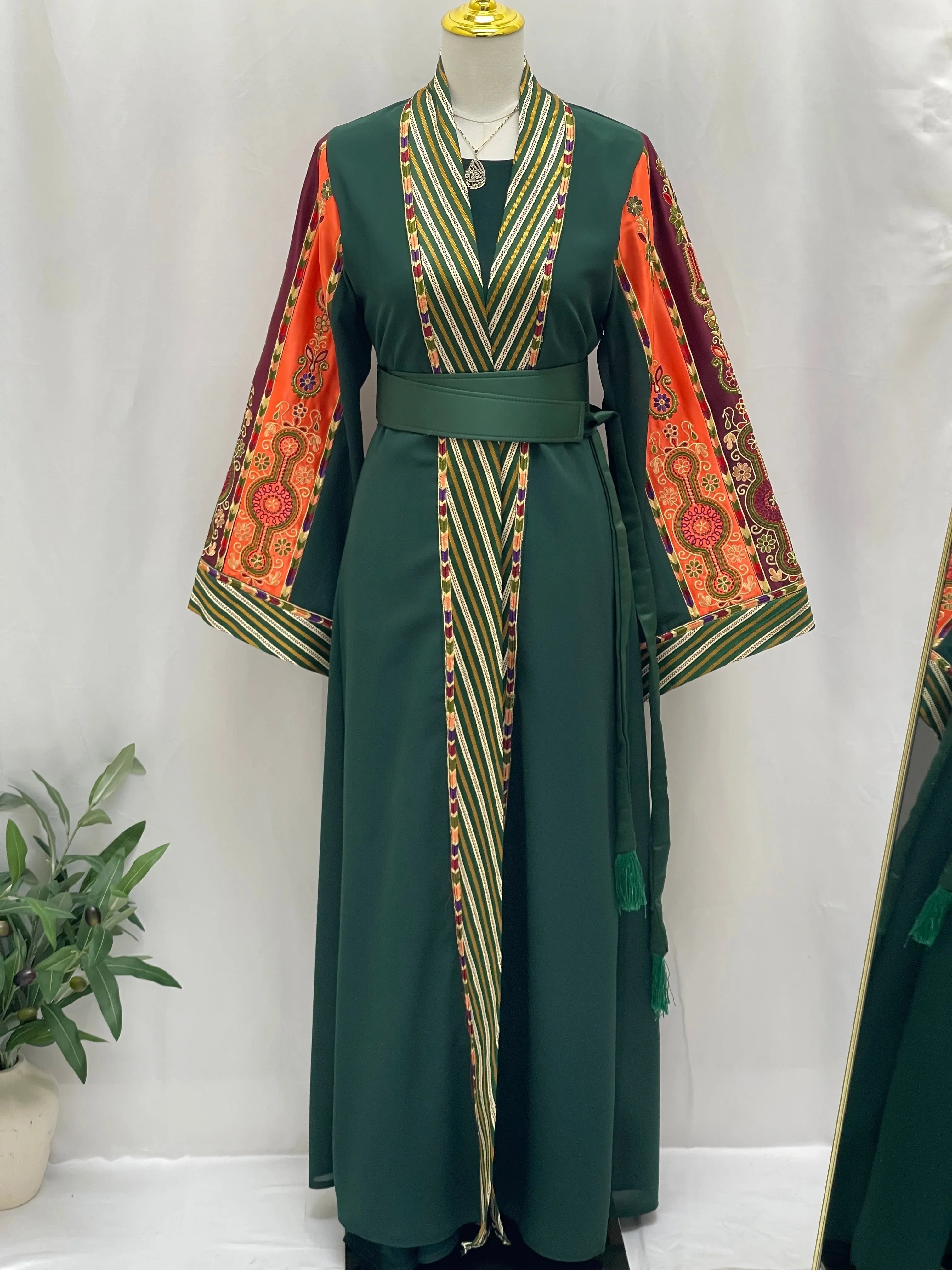 Palestinian Elegance elegant modest fashion bisht cardigan with green body and colorful patterned sleeves