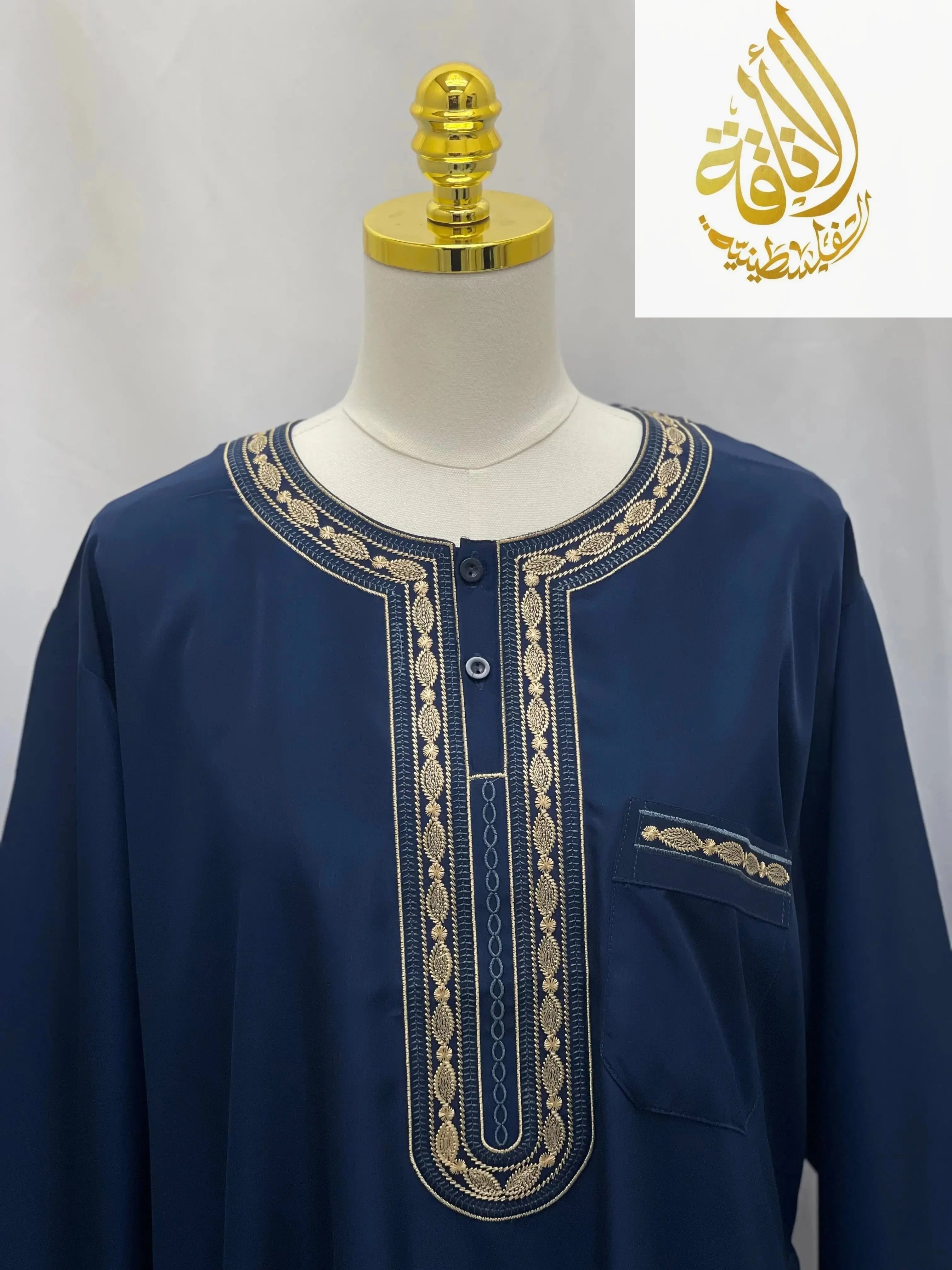 Palestinian Elegance men's navy embroidered thobe dress with detailed gold stitching on neckline and pocket