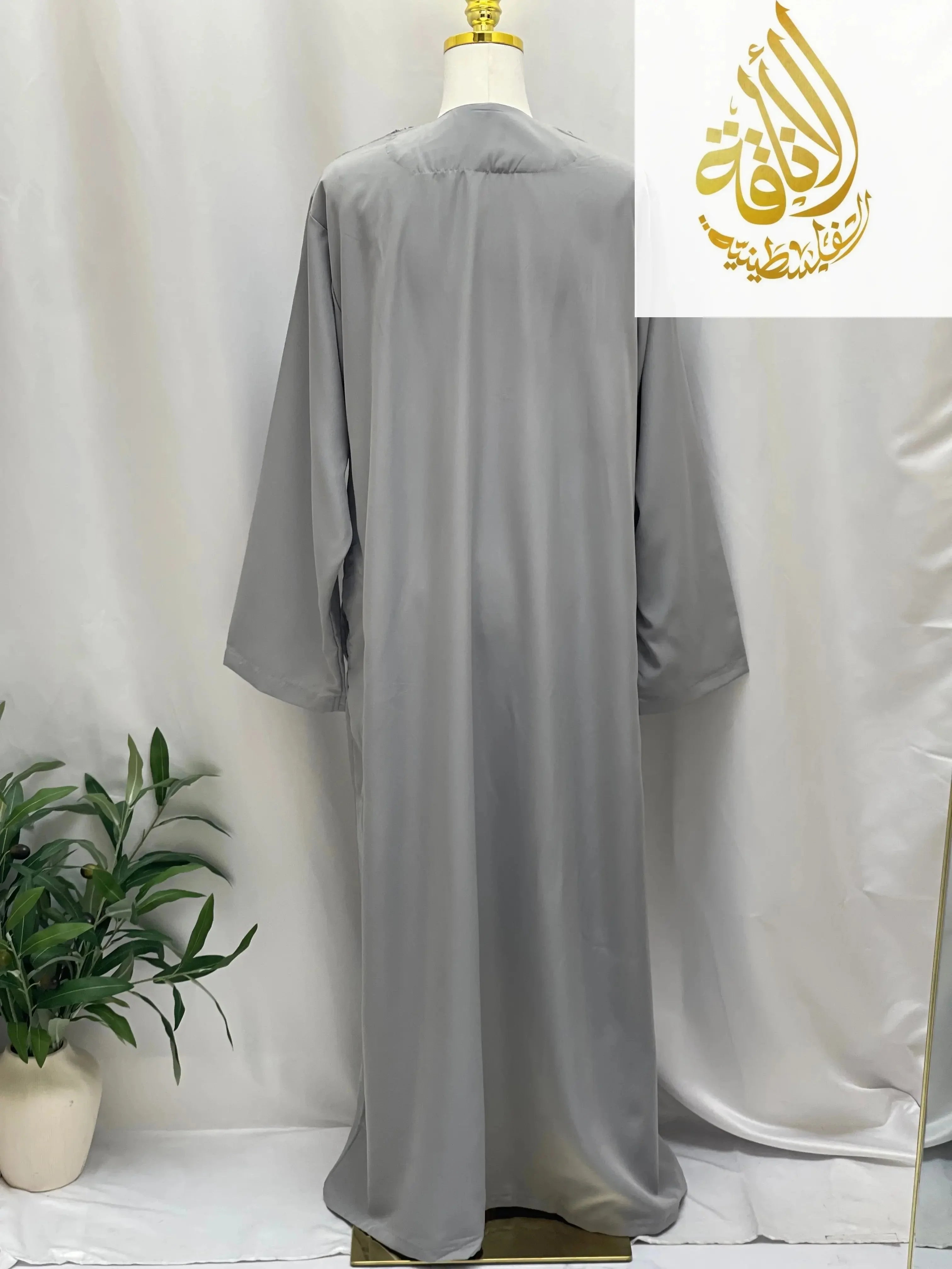 Palestinian Elegance men's gray embroidered thobe dress shown from the back with long sleeves
