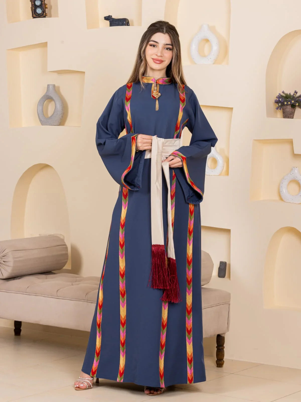 Palestinian Elegance Embroiderd Thoub Al-Manajel navy abaya style thobe with colorful chevron embroidery and tasseled belt