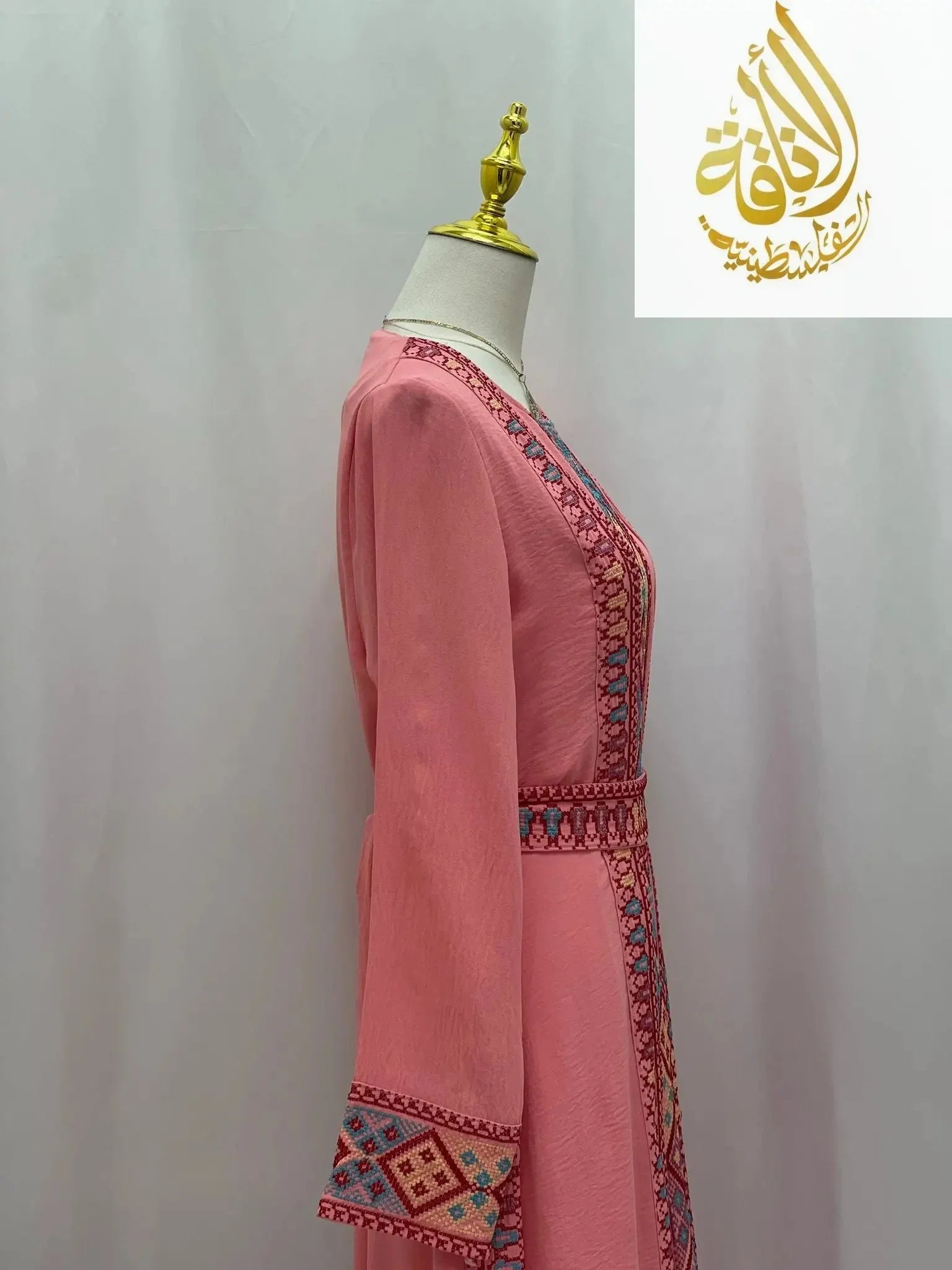 Palestinian Elegance embroidered 2Pcs Abaya in coral pink with detailed traditional embroidery on sleeves and front