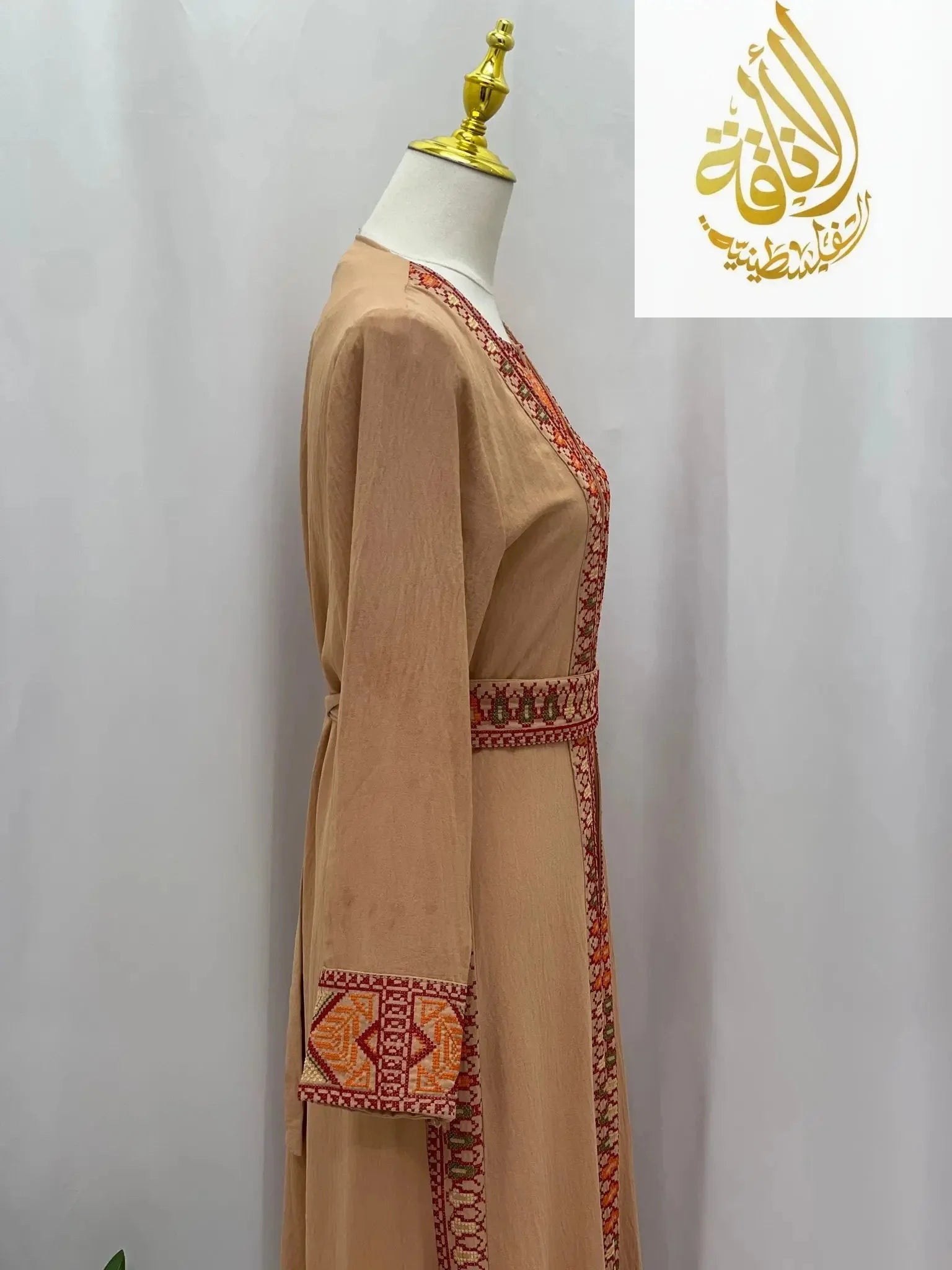Palestinian Elegance Embroidered 2Pcs Abaya in beige with detailed red embroidery on cuffs and front