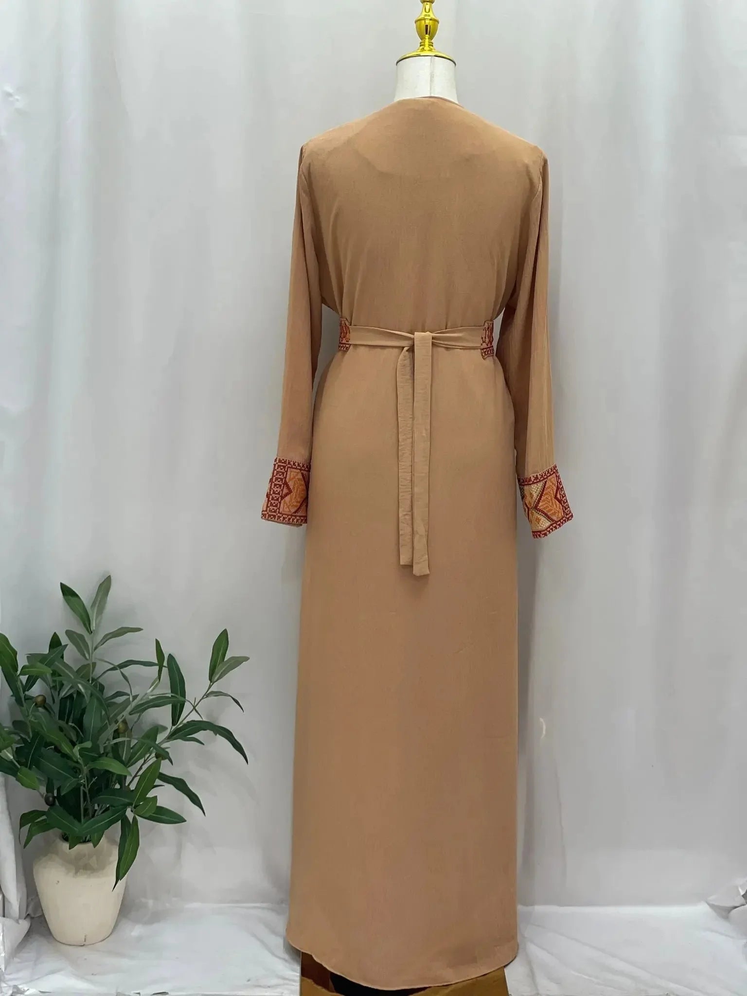 Palestinian Elegance embroidered 2Pcs Abaya in beige with embroidered cuffs and waist tie back view