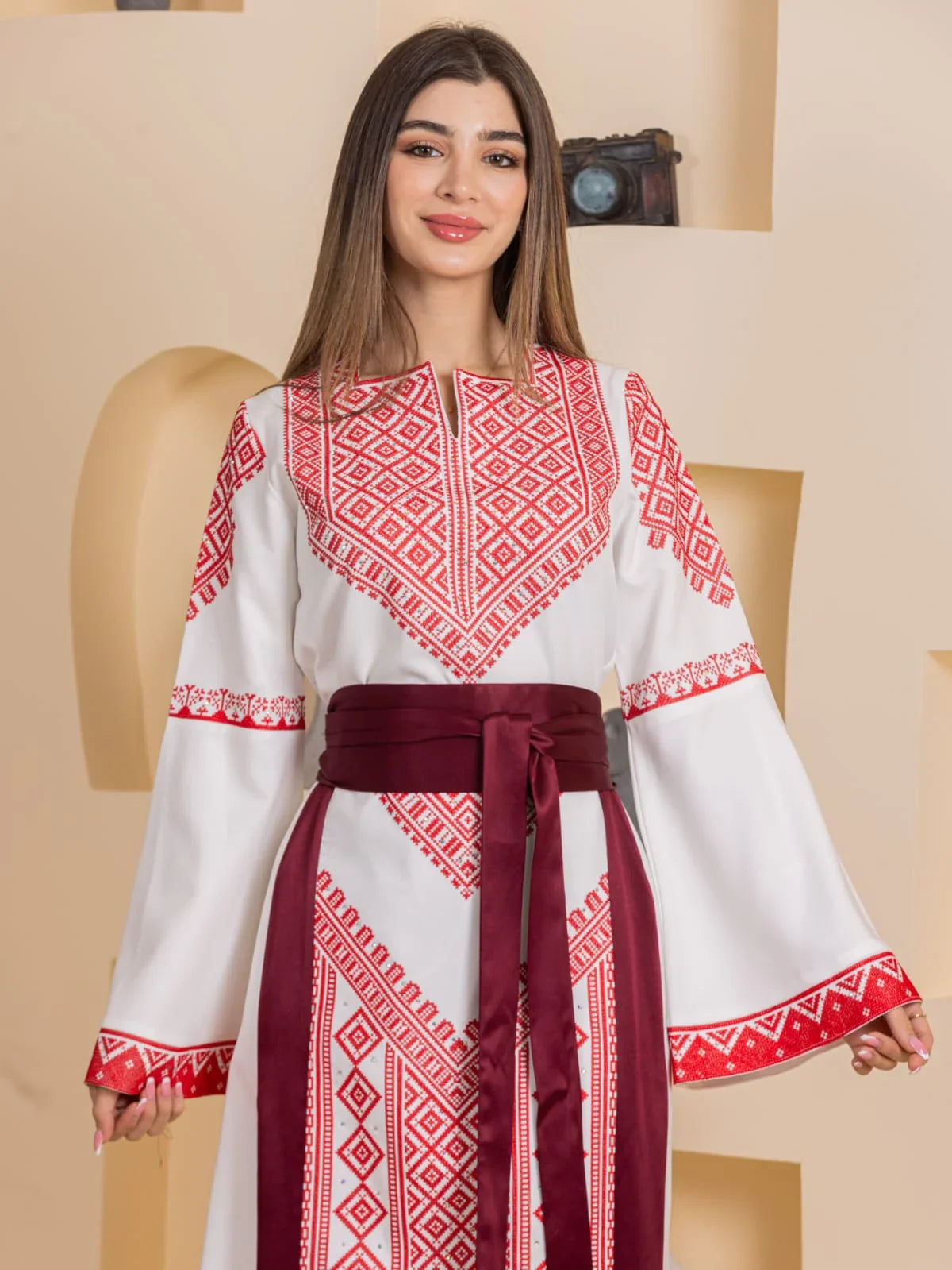 Palestinian Elegance Embroidered Elegance Dress white maxi with red geometric embroidery bell sleeves and maroon sash