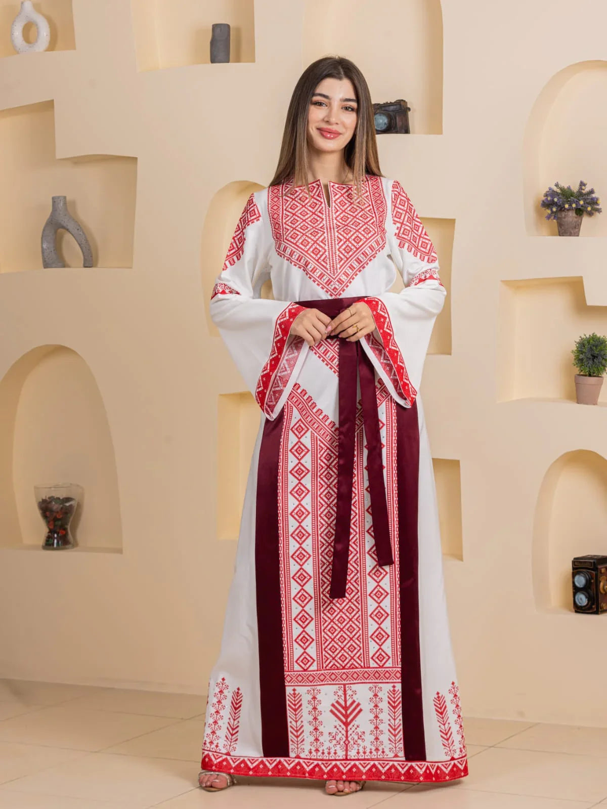 Embroidered Elegance Dress white Palestinian maxi dress with red geometric embroidery maroon panels and sash