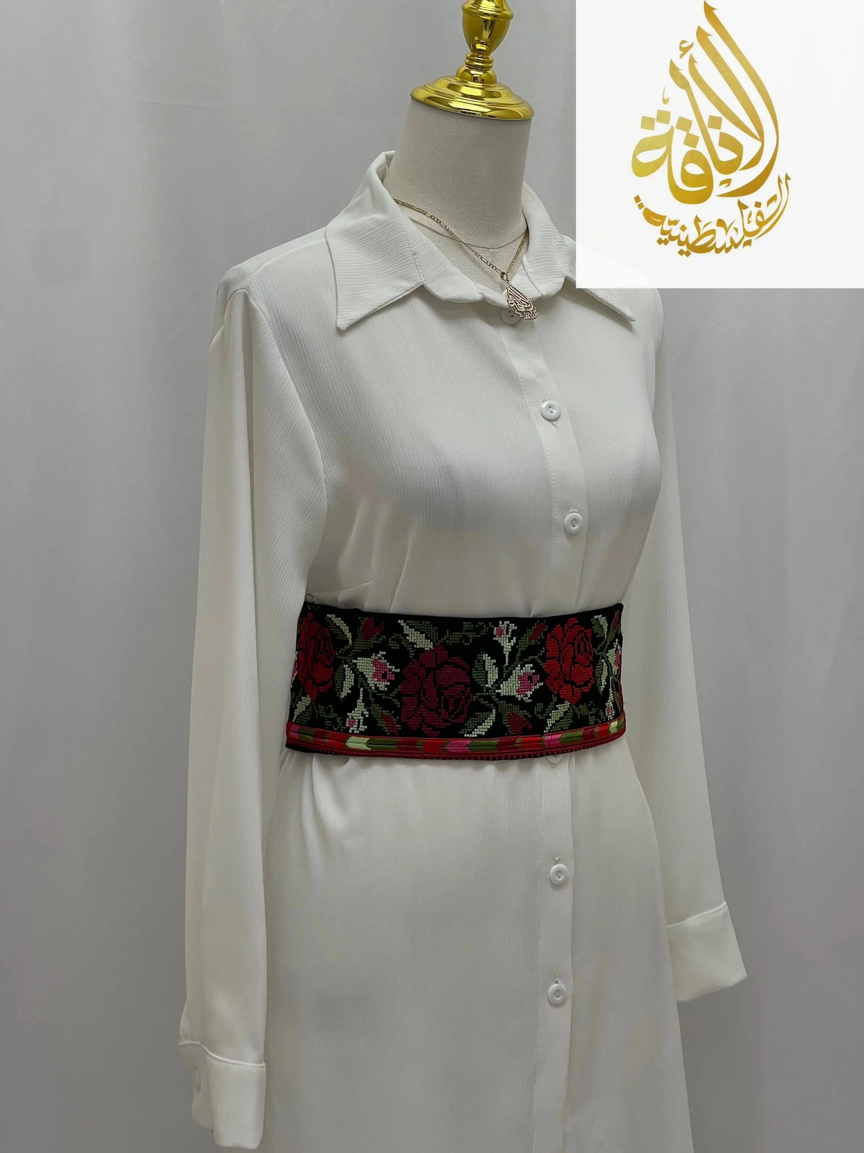 Palestinian Elegance Embroidered Heritage Belt with traditional floral patterns worn over white dress