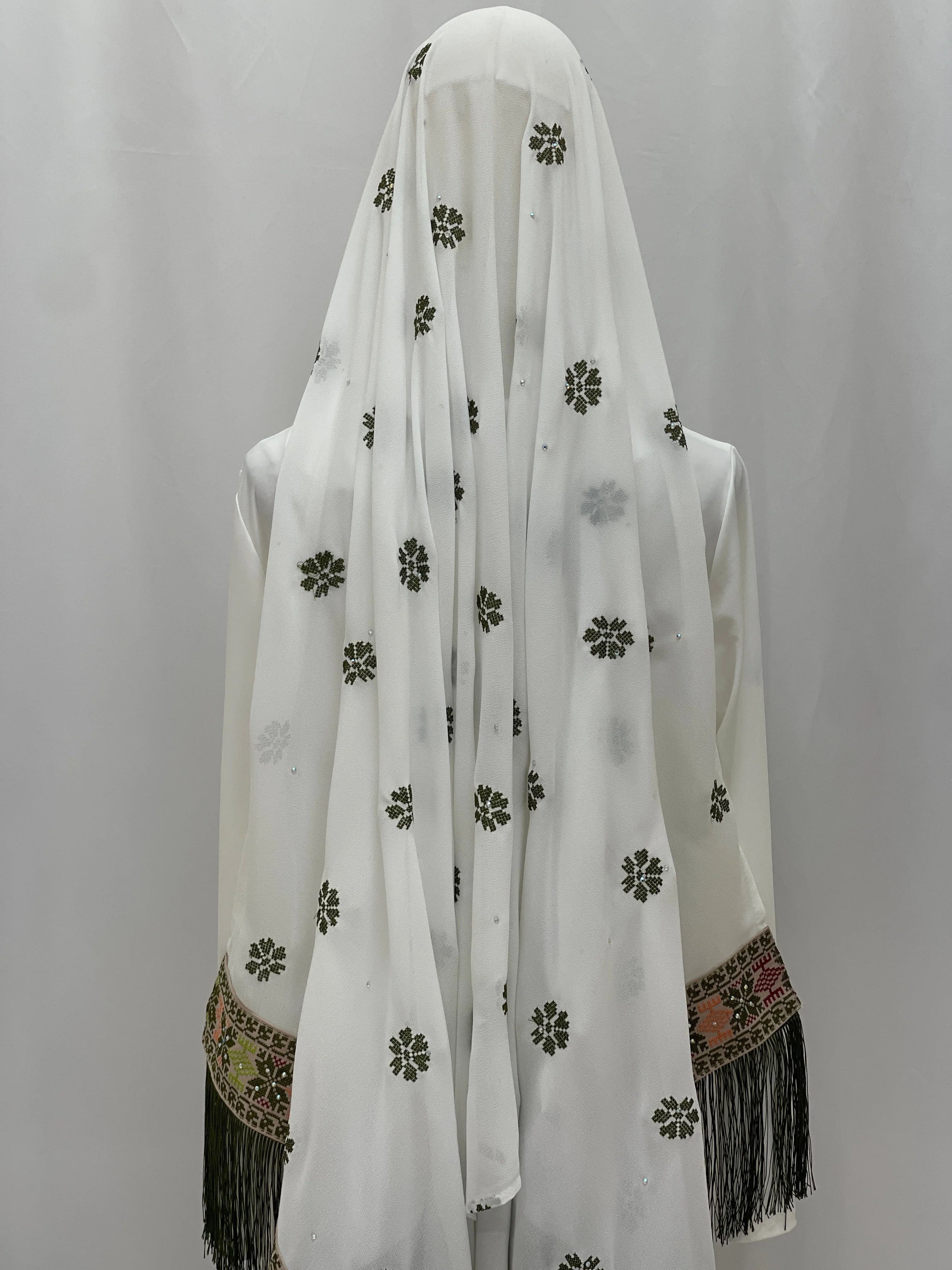 Embroidered Khirka with tassels in white fabric adorned with floral patterns and intricate detailing