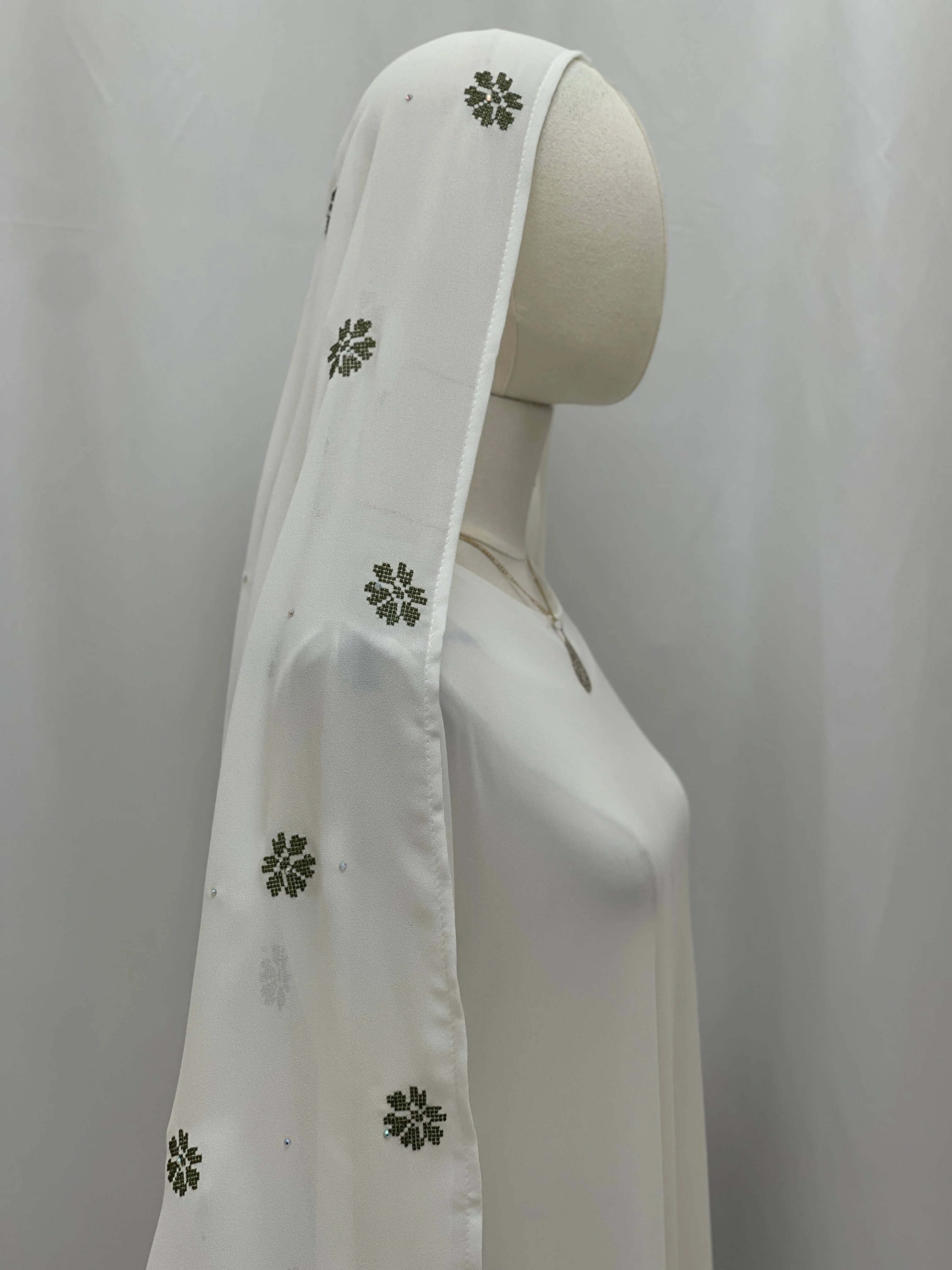 Elegant Embroidered Khirka With tassels in white featuring intricate floral patterns on the fabric
