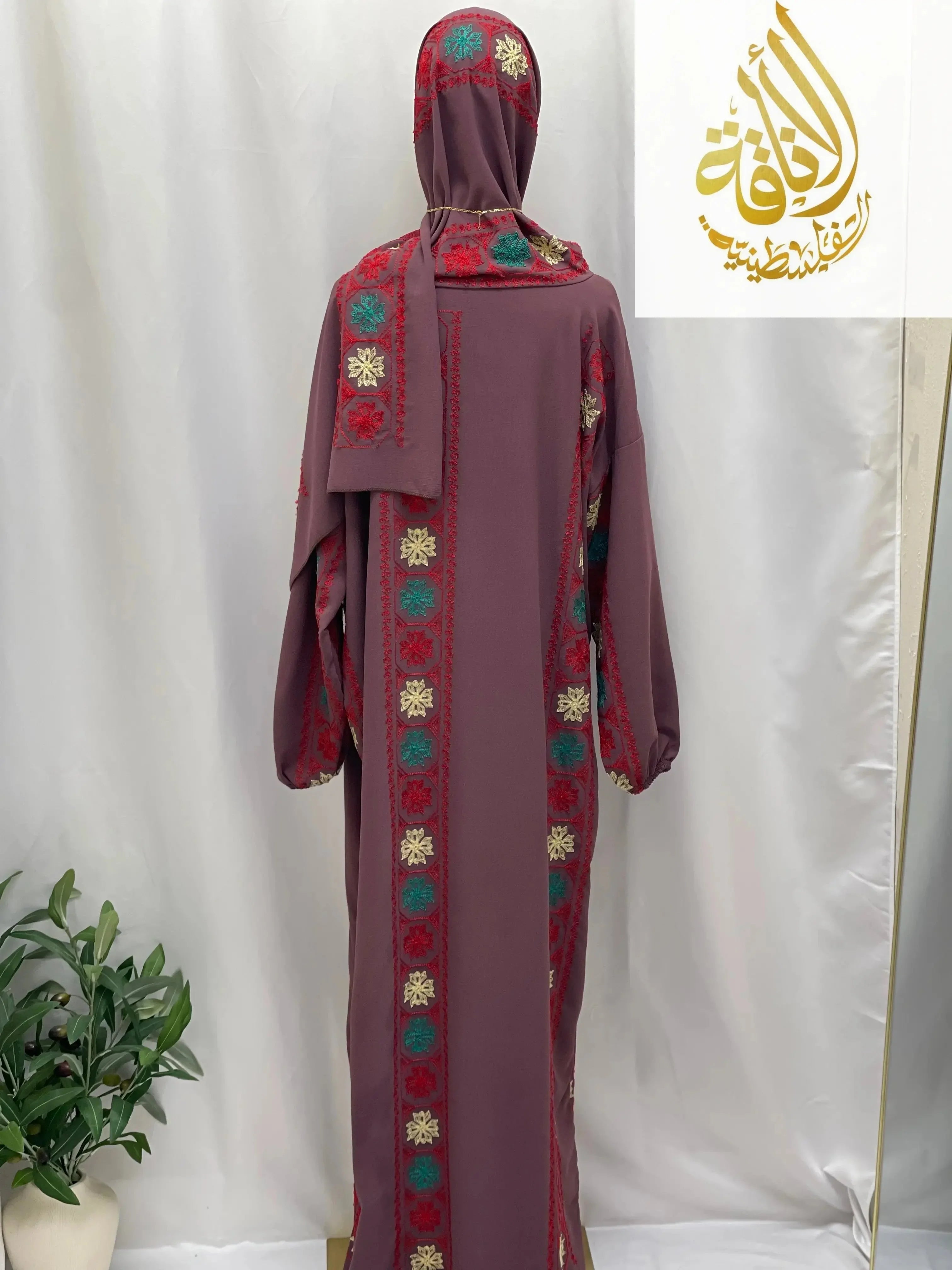 Palestinian Elegance embroidered prayer dress in deep maroon with colorful traditional floral embroidery