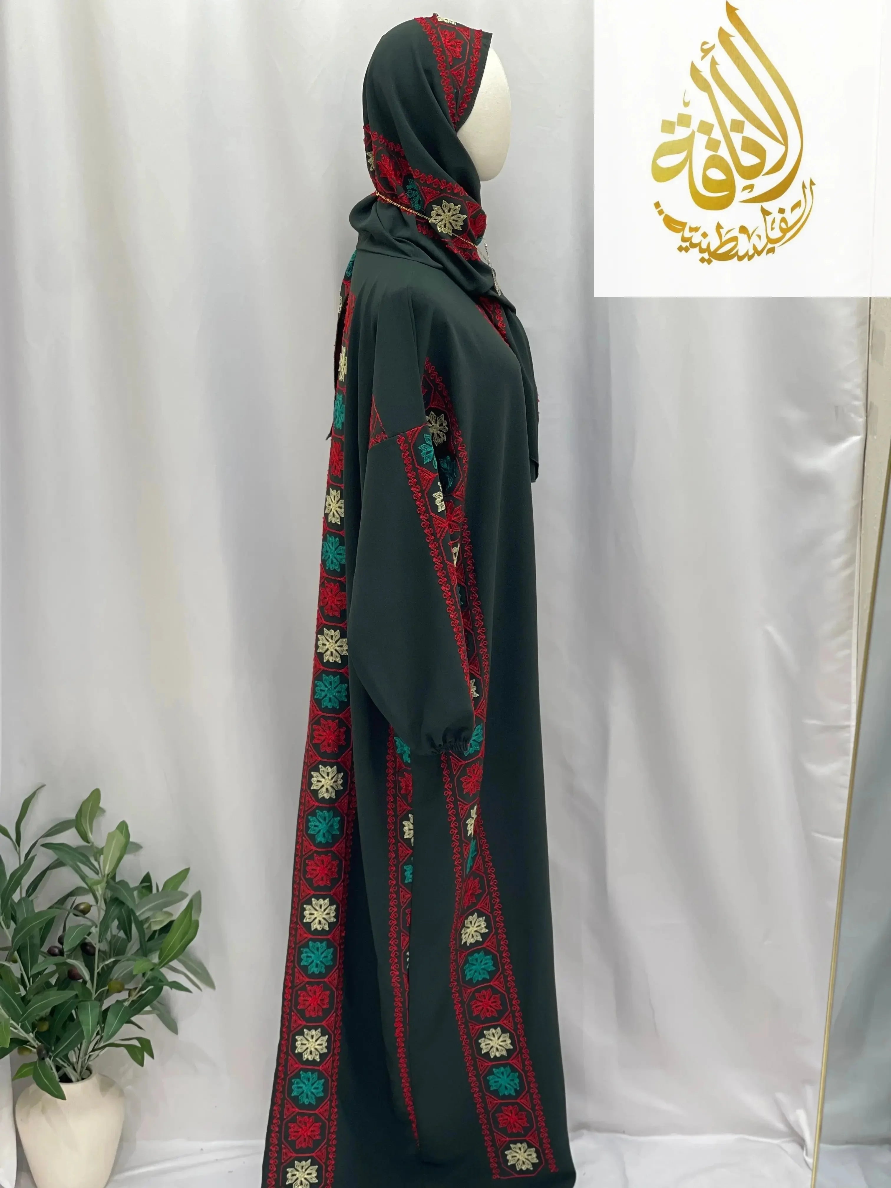 Palestinian Elegance embroidered prayer dress in dark green with red and multicolor traditional embroidery