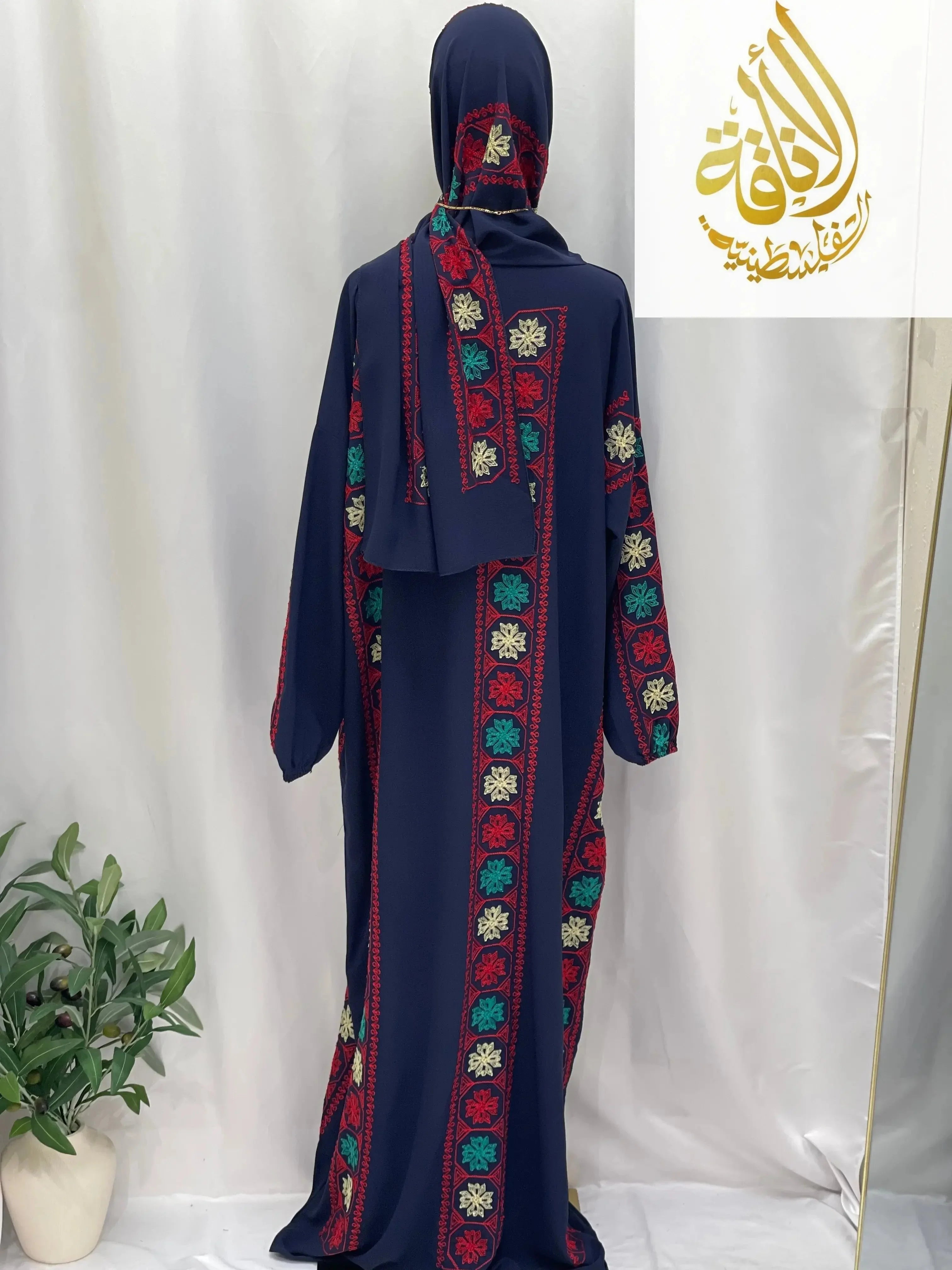 Palestinian Elegance embroidered prayer dress in navy with colorful floral embroidery and matching headscarf