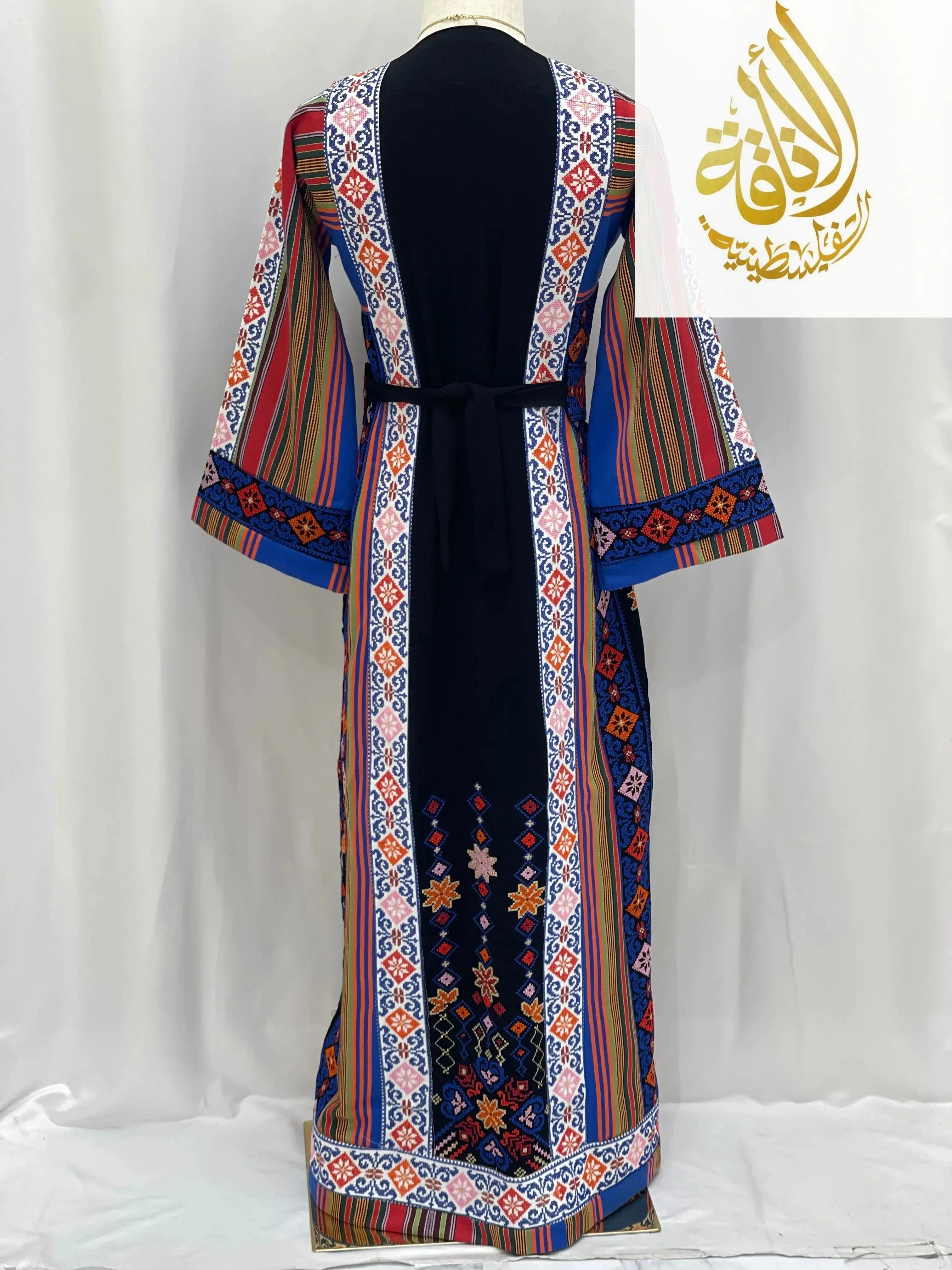 Palestinian Elegance embroidered thoub for teens with colorful geometric and floral embroidery on striped fabric