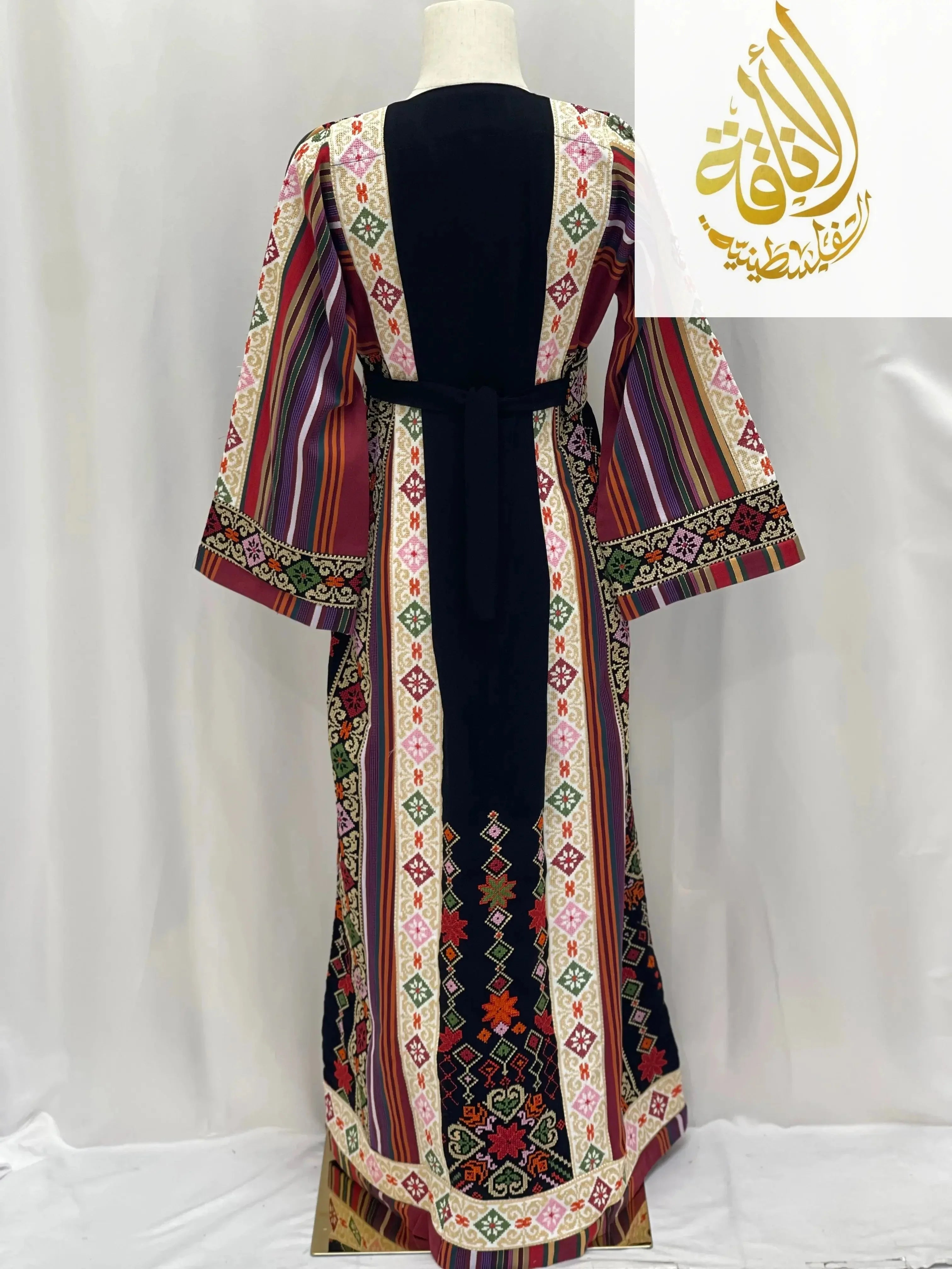 Palestinian Elegance embroidered thoub for teens with colorful traditional embroidery and striped patterns
