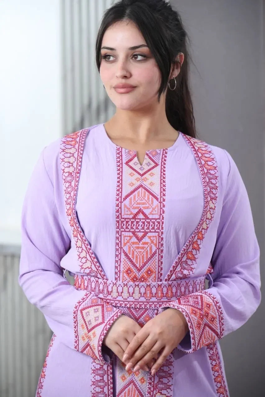 Palestinian Elegance embroidered abaya for women in light purple with intricate red embroidery details