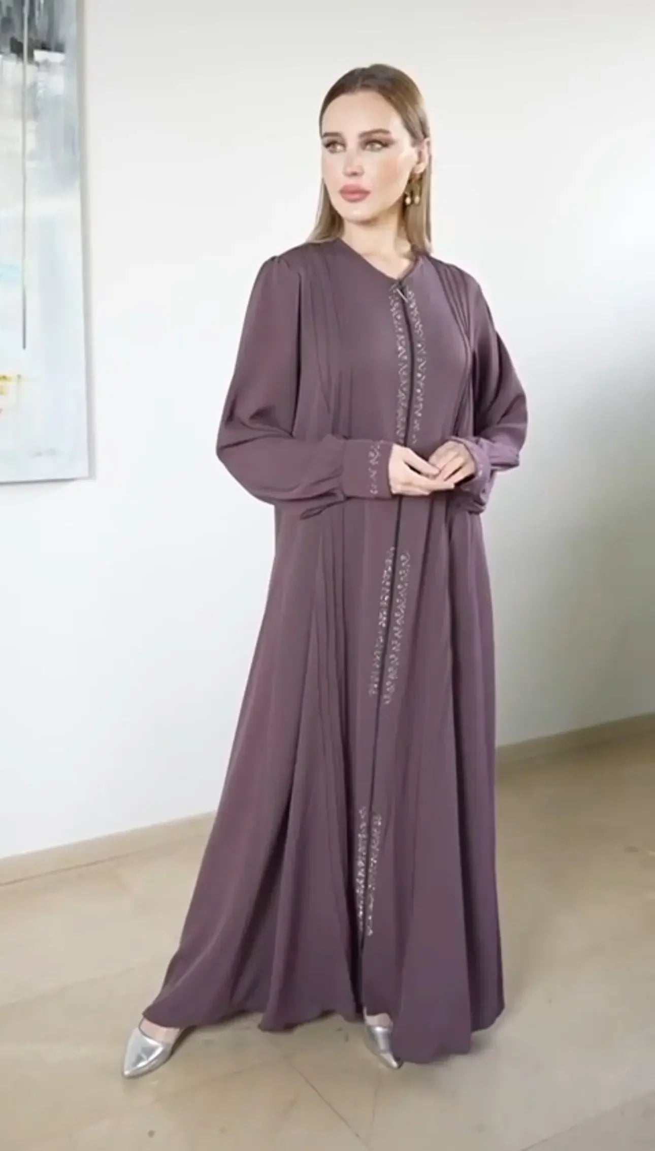 Palestinian Elegance modest abaya for women in purple with long sleeves and detailed front embroidery
