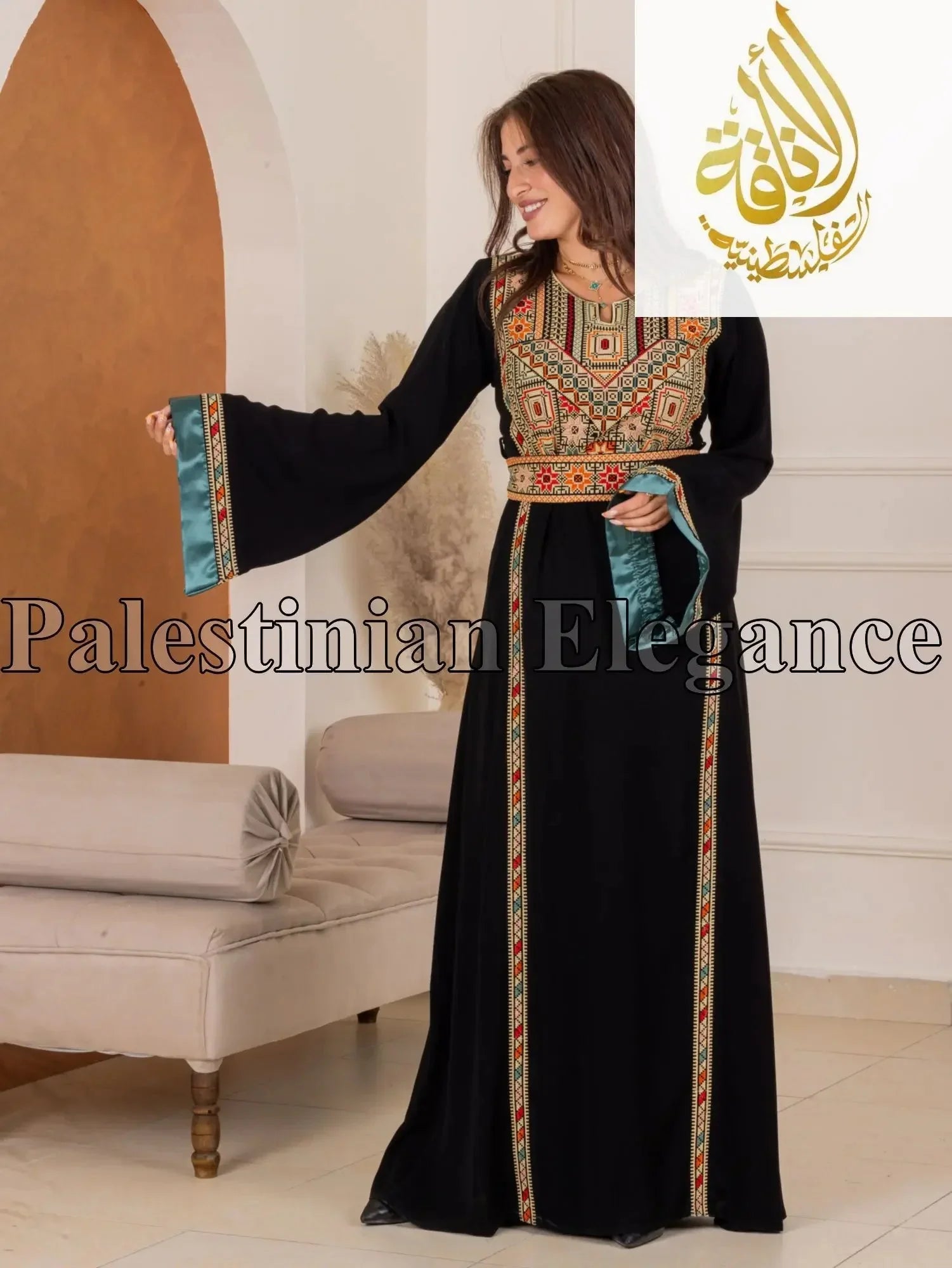 Woman wearing a black Fadwa Embroidered Thoub with intricate colorful embroidery by Palestinian Elegance