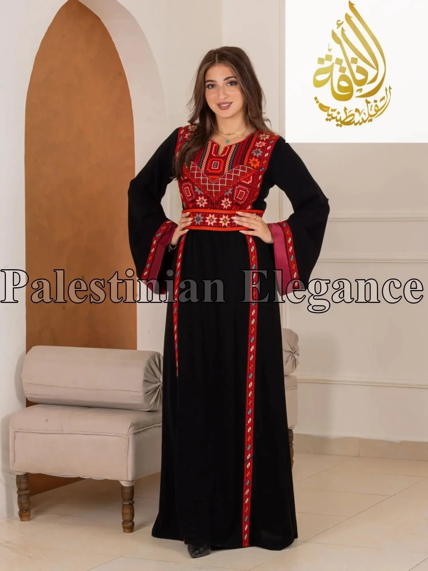 Woman wearing black Fadwa Embroidered Thoub with red traditional embroidery and wide sleeves
