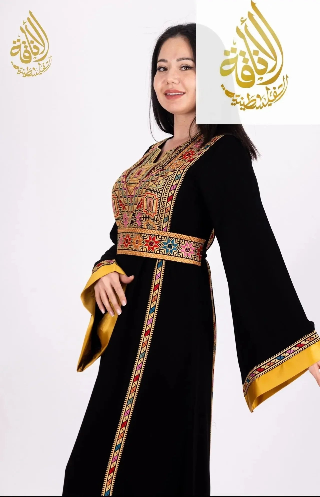Palestinian Elegance Fadwa Embroidered Thoub black traditional dress with colorful intricate embroidery